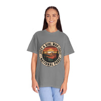 Just a Girl Who Loves National Parks T-Shirt made of soft garment-dyed cotton with relaxed fit and outdoor-inspired design