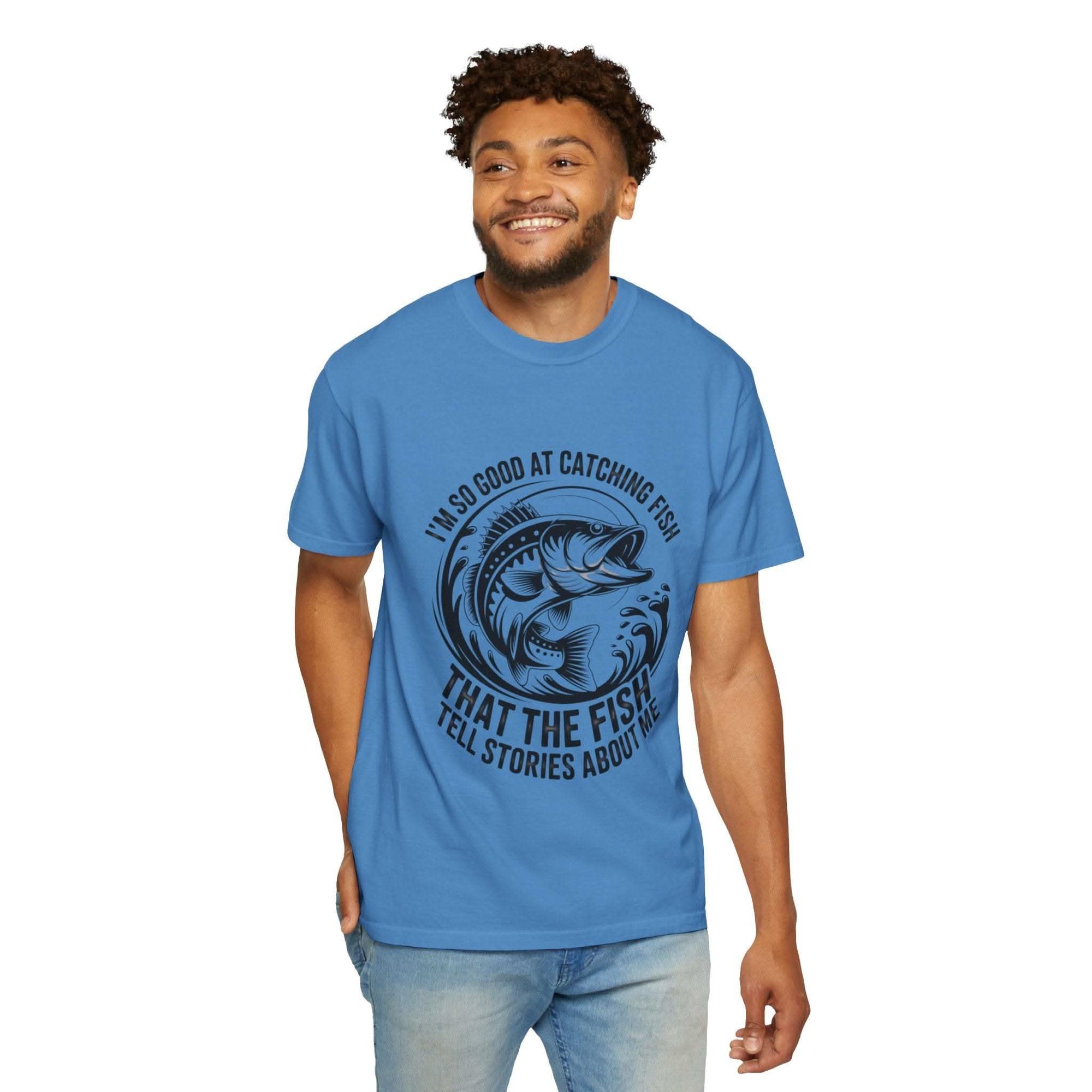 Fishing T-Shirt with humorous "So Good At Catching Fish That The Fish Tell Stories About Me" text on soft cotton tee