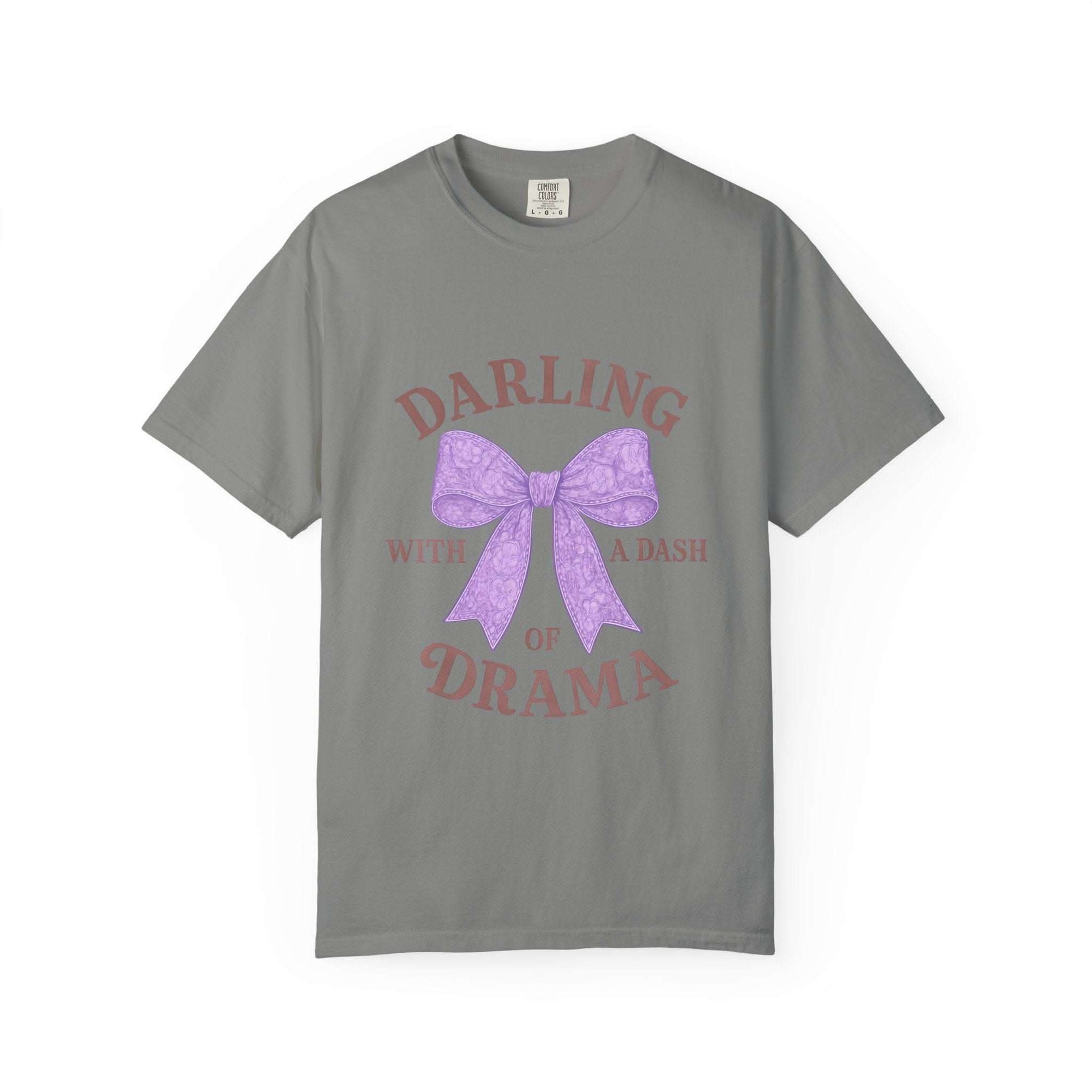 Gray t-shirt with a purple bow and text on a white background