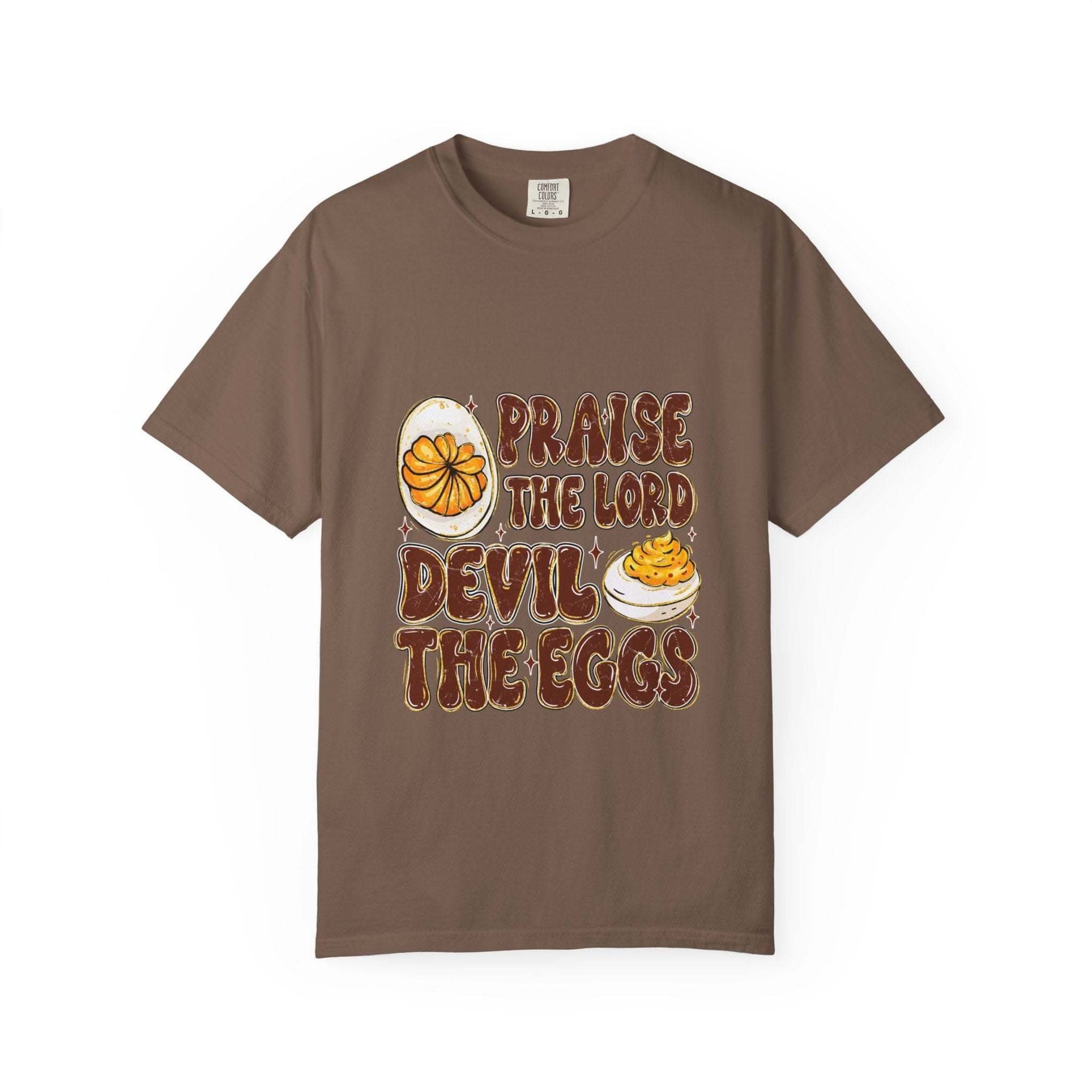 White cotton t-shirt featuring 'Praise the Lord, Devil the Eggs' design by Printify, perfect for Easter.