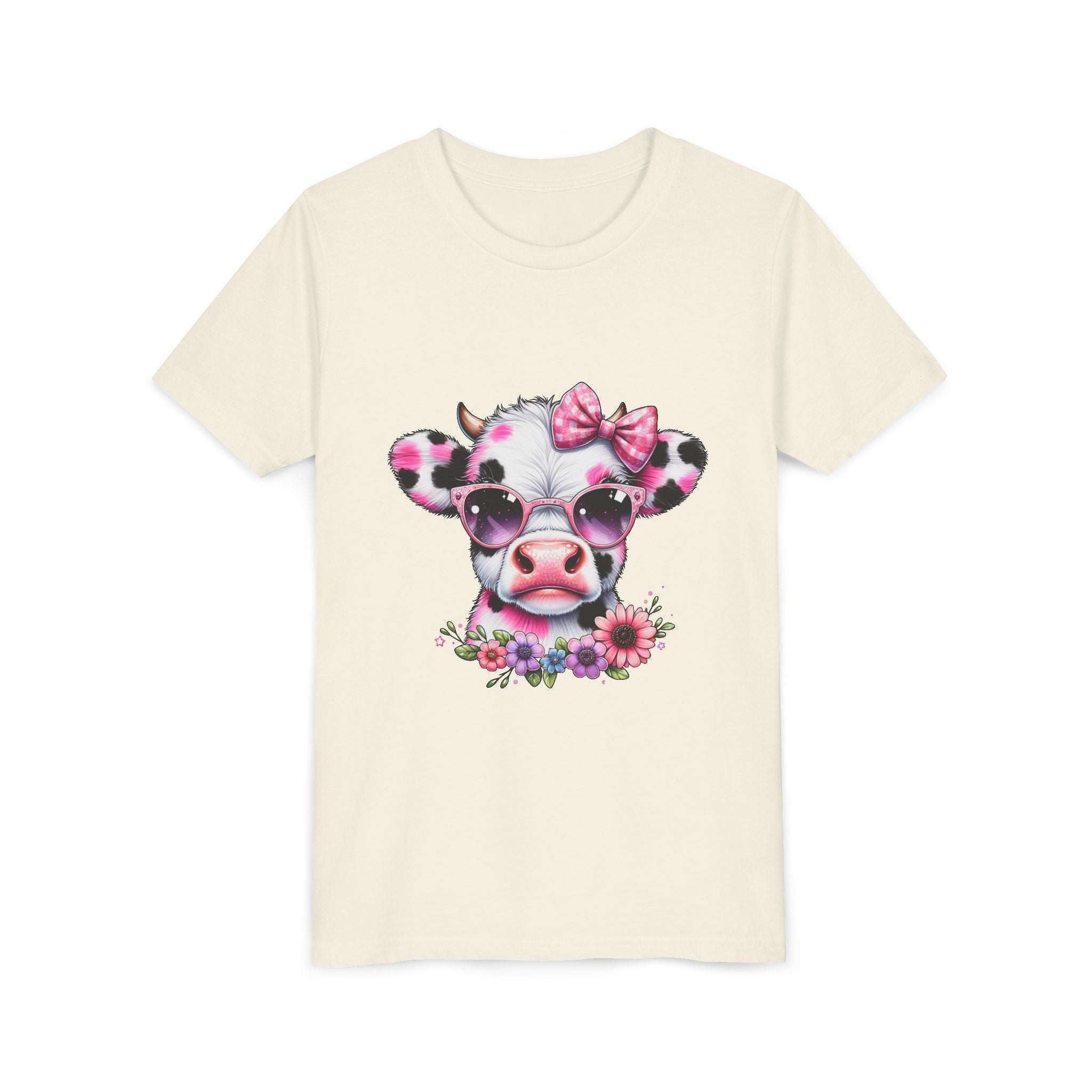 Beige t-shirt with a cow design featuring a pink bow and flowers on a white background