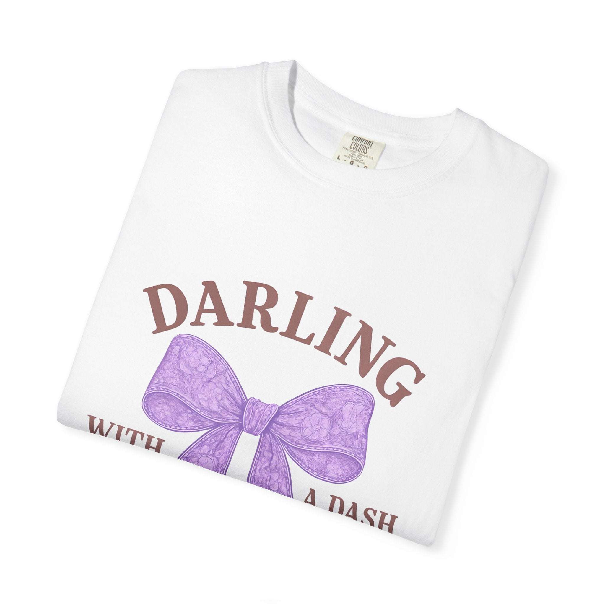 White t-shirt with purple bow and text on a white background