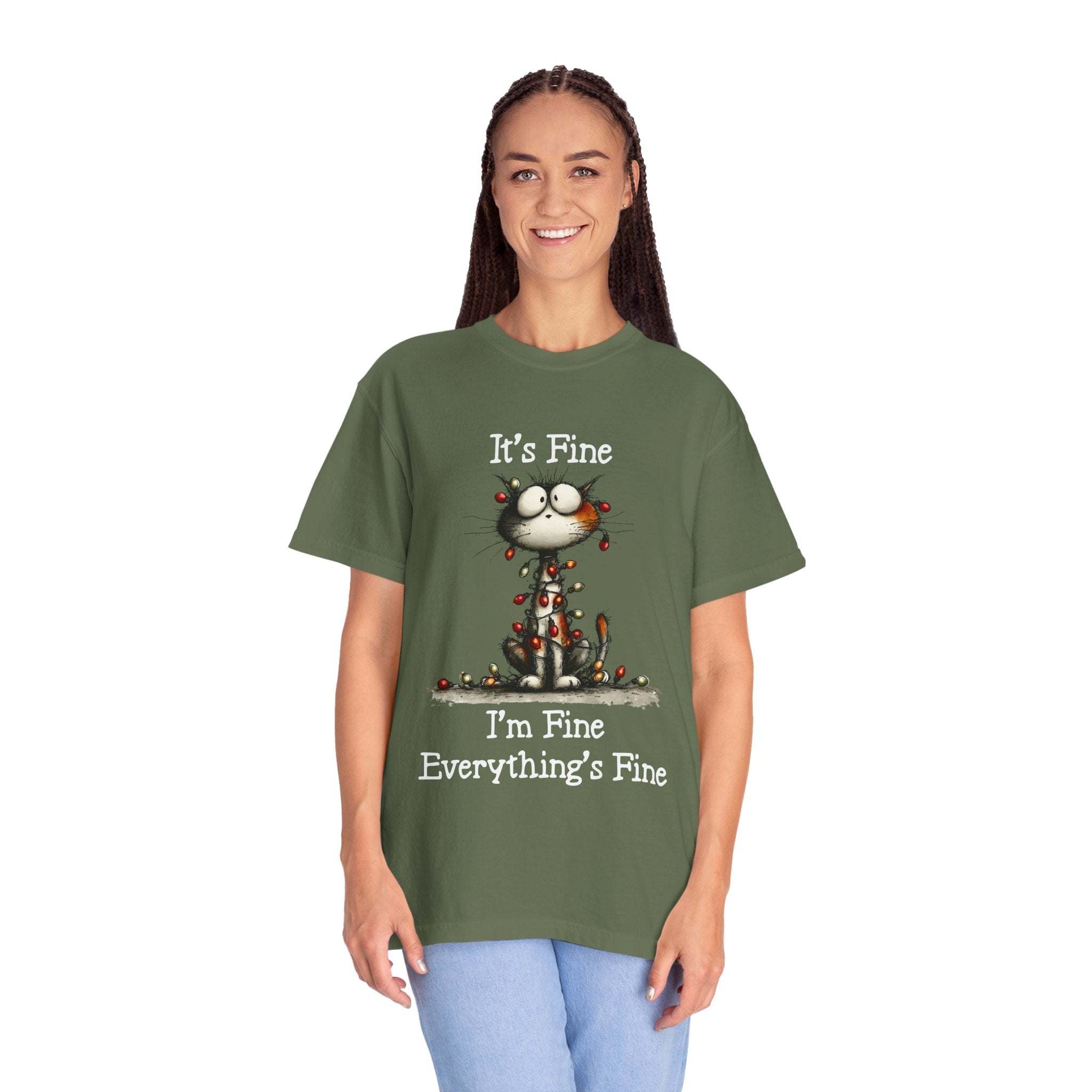 Person wearing a green t-shirt with a graphic and text on a white background