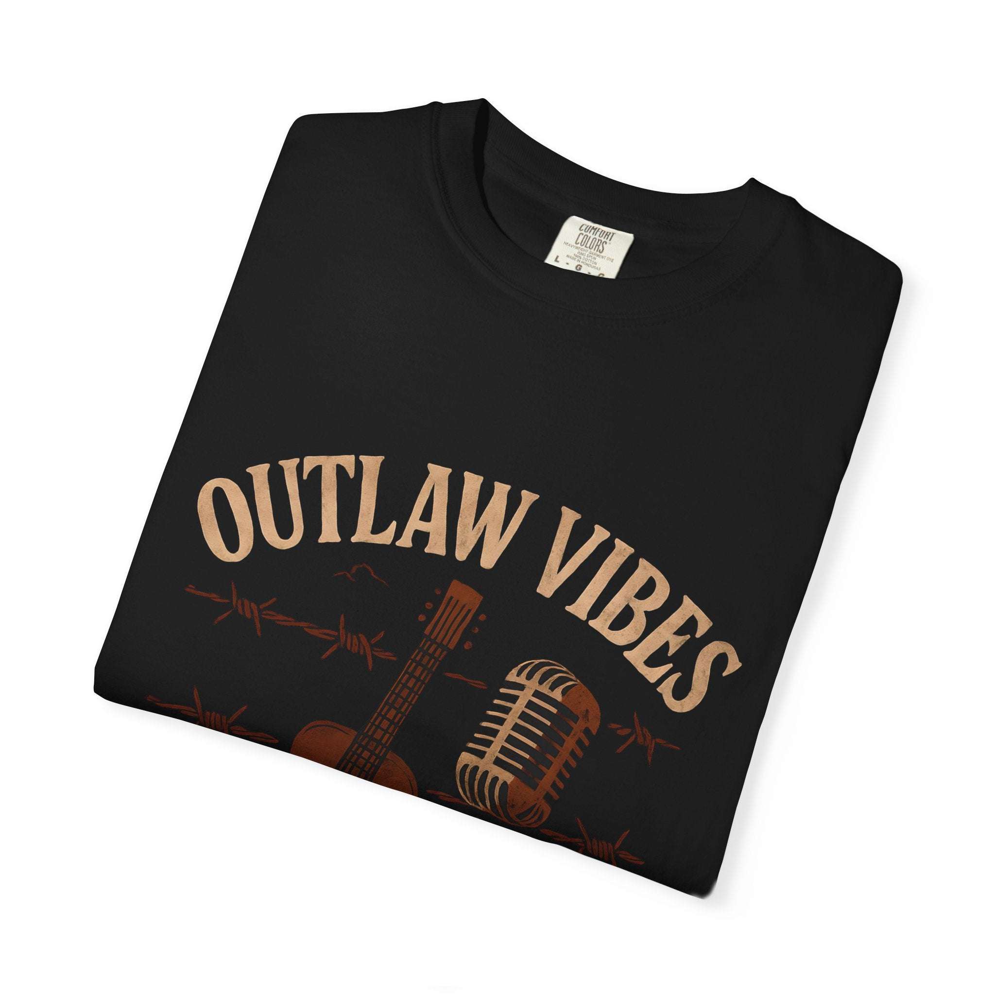 Black t-shirt with 'Outlaw Vibes' text and graphics on a white background