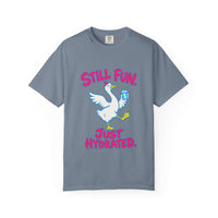 A blue crewneck t-shirt featuring a cartoon graphic of a white goose holding a blue water bottle, with the pink text 'STILL FUN. JUST HYDRATED.