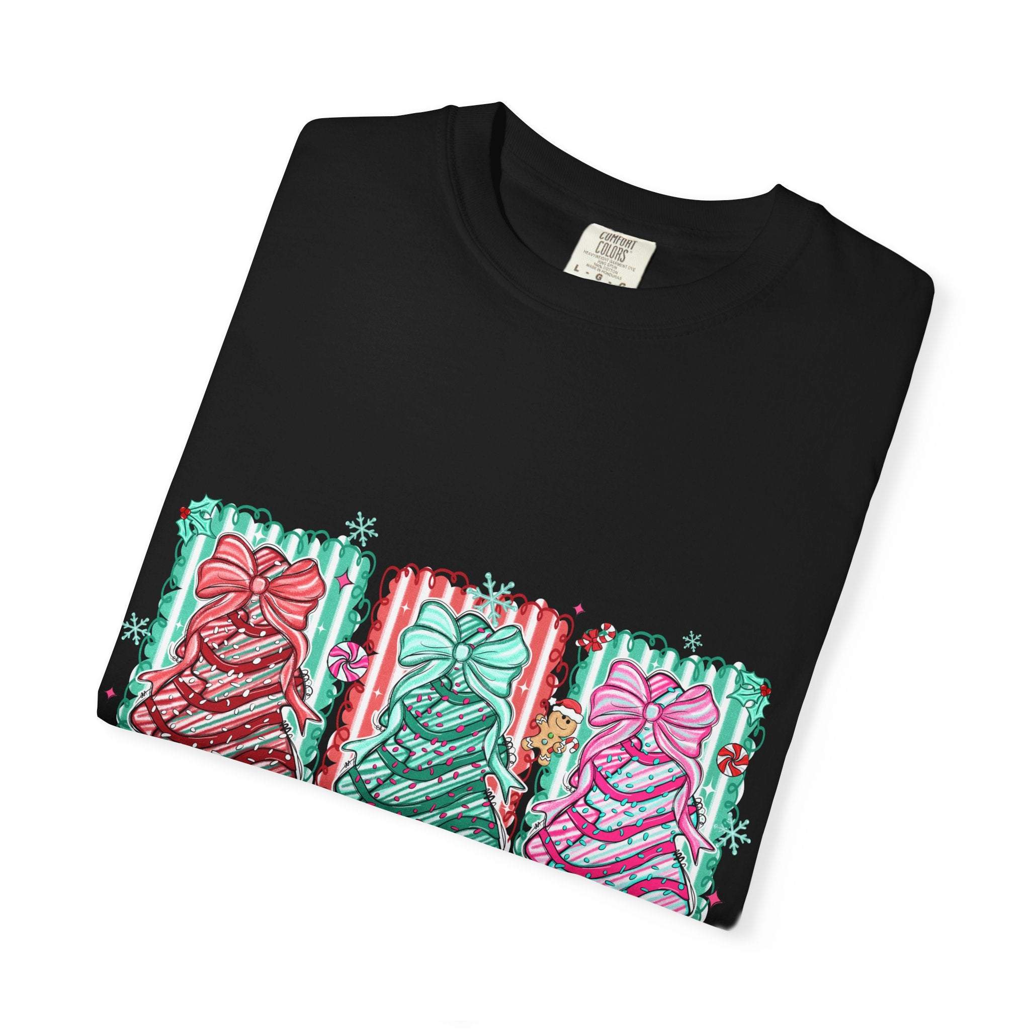 Black garment-dyed Oh Christmas Tree T-shirt with colorful festive bow designs and holiday-themed decorations