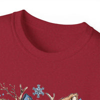 White t-shirt with retro patchwork reindeer design wearing blue scarf and surrounded by snowflakes