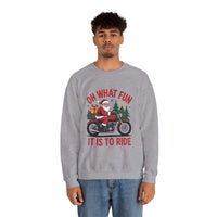 Man wearing navy Motorcycle Santa Sweatshirt with Santa on motorcycle and holiday gifts design in festive setting
