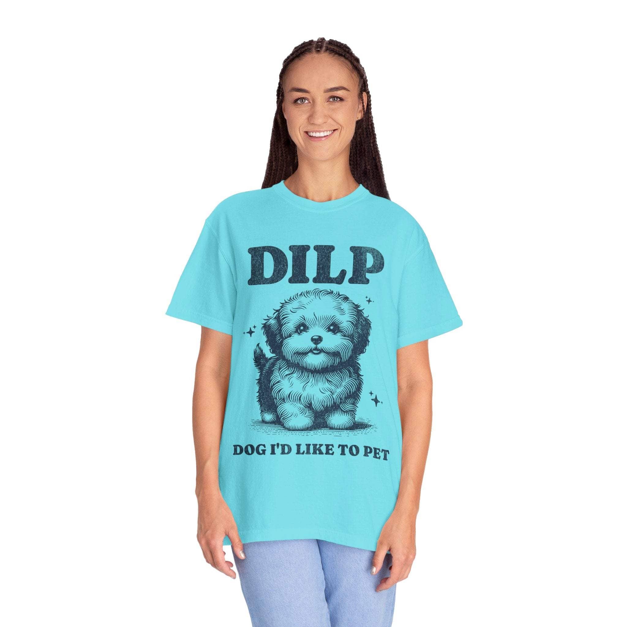 Woman wearing blue garment-dyed T-shirt with DILP dog graphic and text "Dog I'd Like To Pet"
