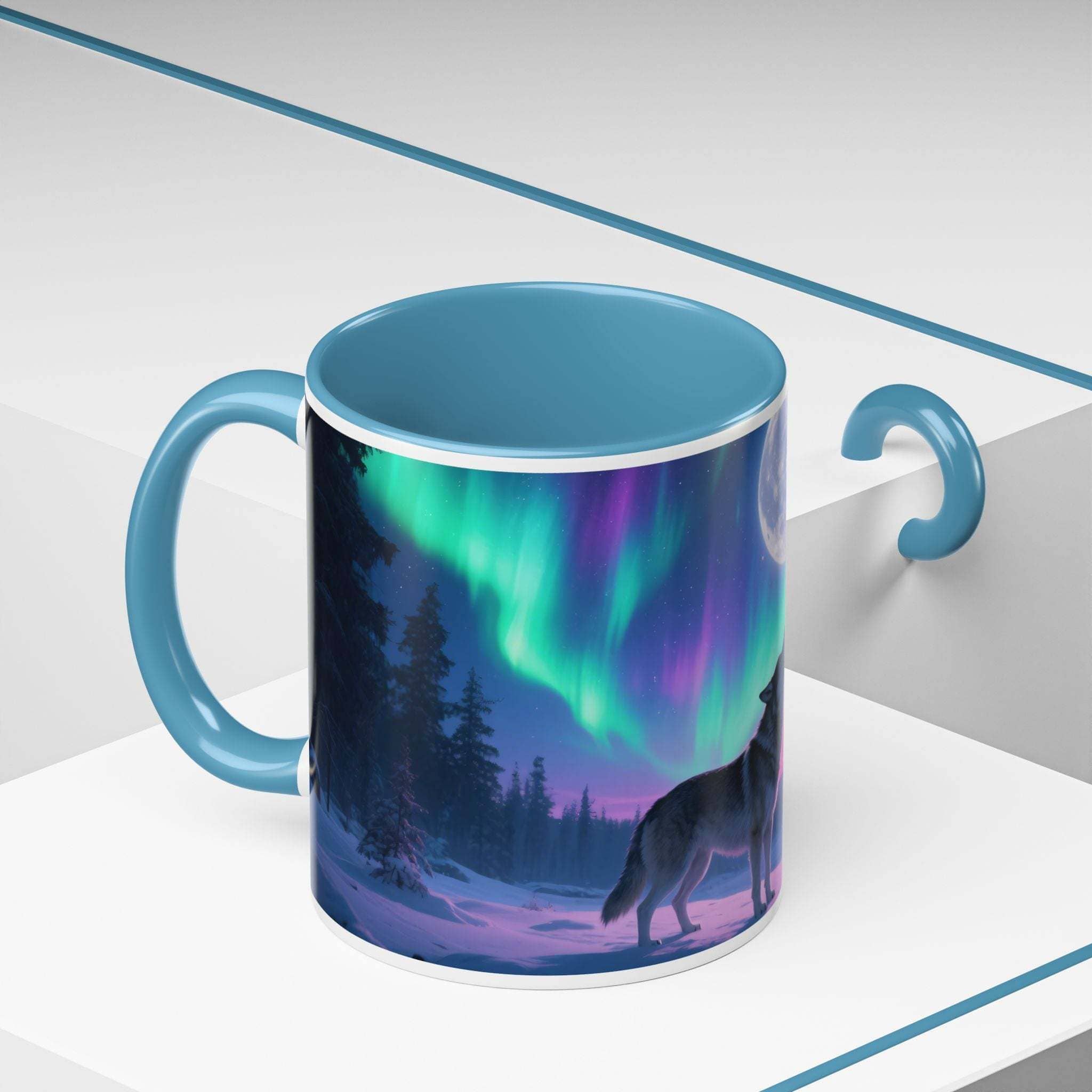 Mug with a design of a wolf under the Northern Lights on a white surface.