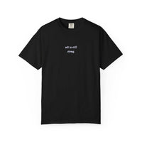 Black t-shirt with white text 'soft is still strong' on a white background