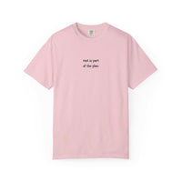 Pink t-shirt with text 'rest is part of the plan' on a white background
