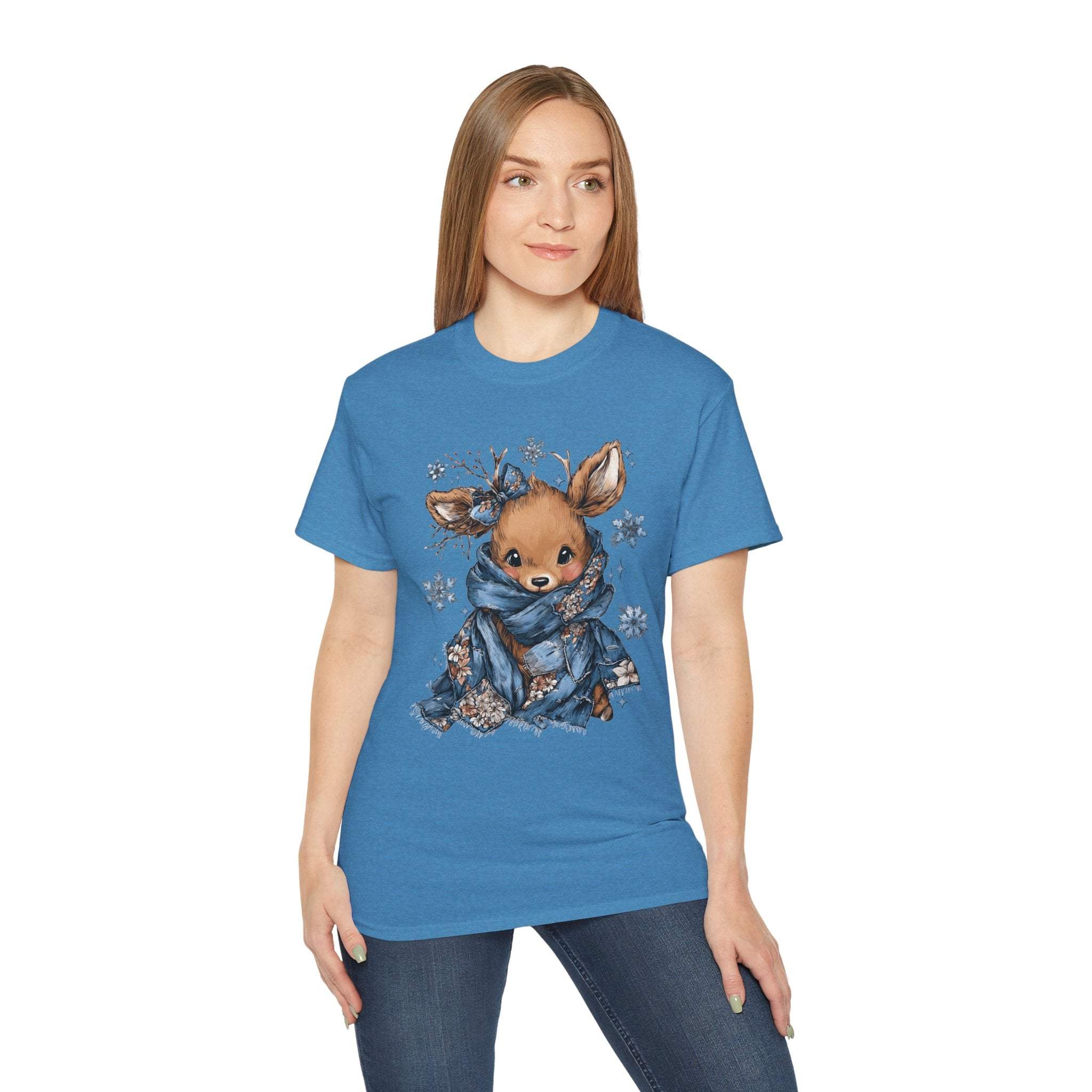 Woman wearing blue Retro Patchwork Reindeer T-shirt with cute reindeer design and scarf.