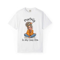 White Mentally in My Cozy Era T-shirt with illustration of a girl sitting cross-legged and hand-lettered text on chest