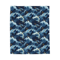 Navy blue velveteen plush blanket with high-detail ocean wave pattern and gold moonlight accents