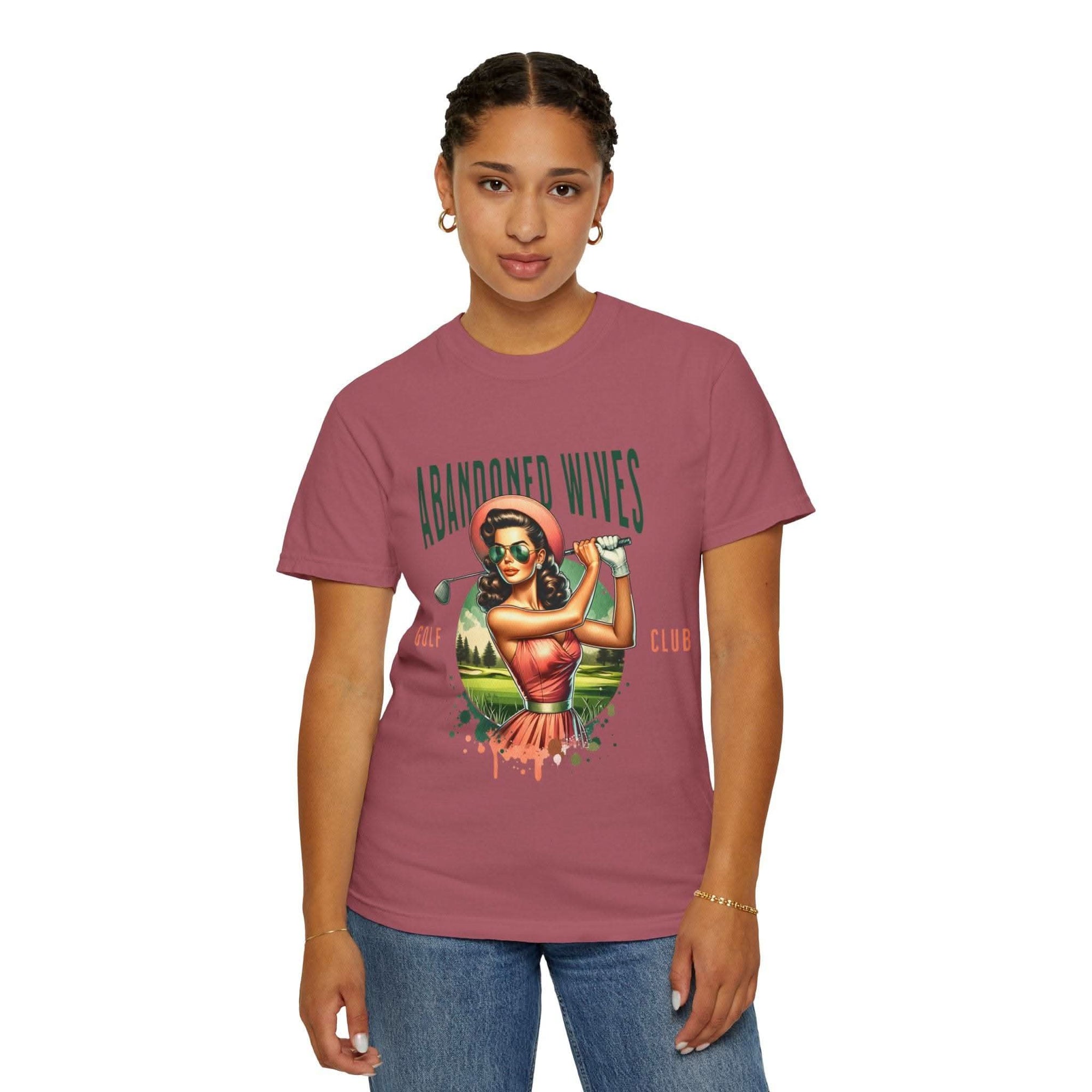 Vintage unisex t-shirt with Abandoned Wives Golf Club graphic design worn by model