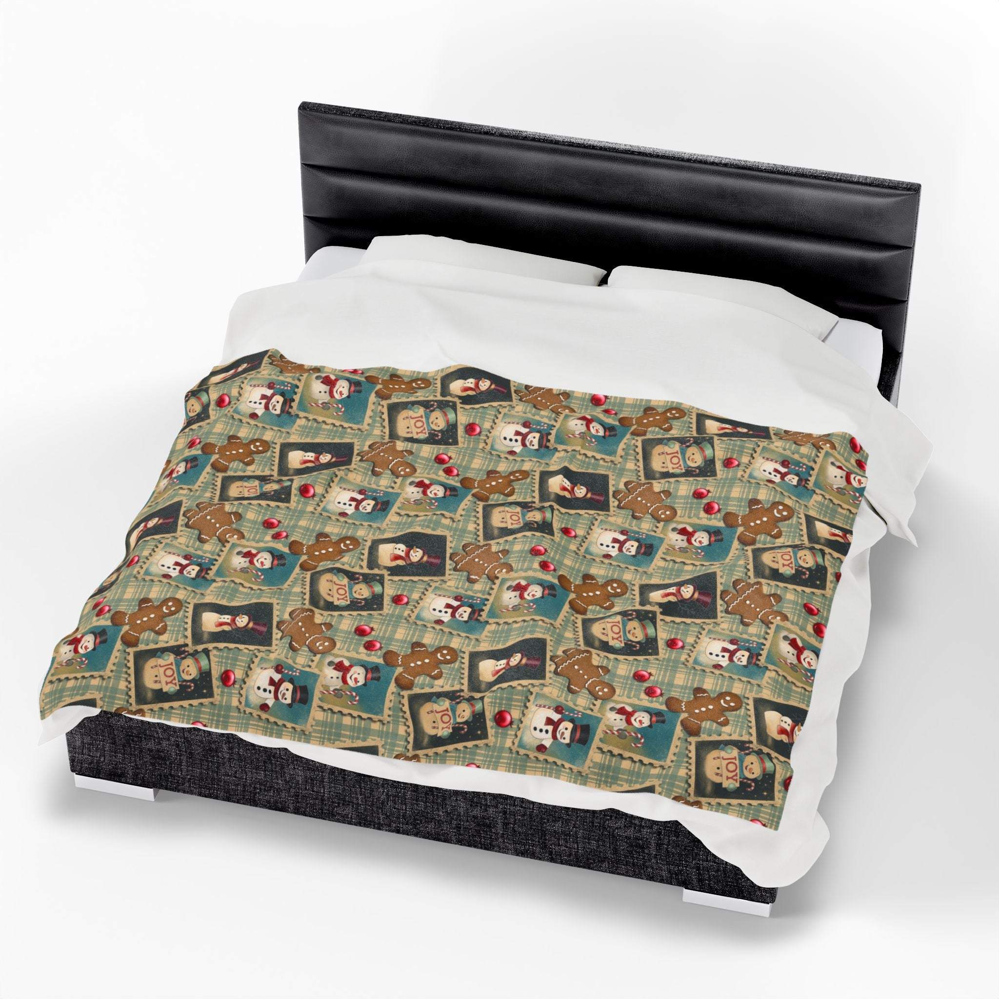 Plush blanket with retro Christmas watercolor design featuring festive holiday icons on bed