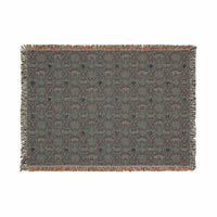 Victorian Gothmas Woven Blanket with deep blacks, faded crimson, holly greens, and colorful fringed edges