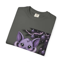 Gothmas Bat T-Shirt with cute purple bat under gothic holiday decorations on dark garment-dyed cotton tee