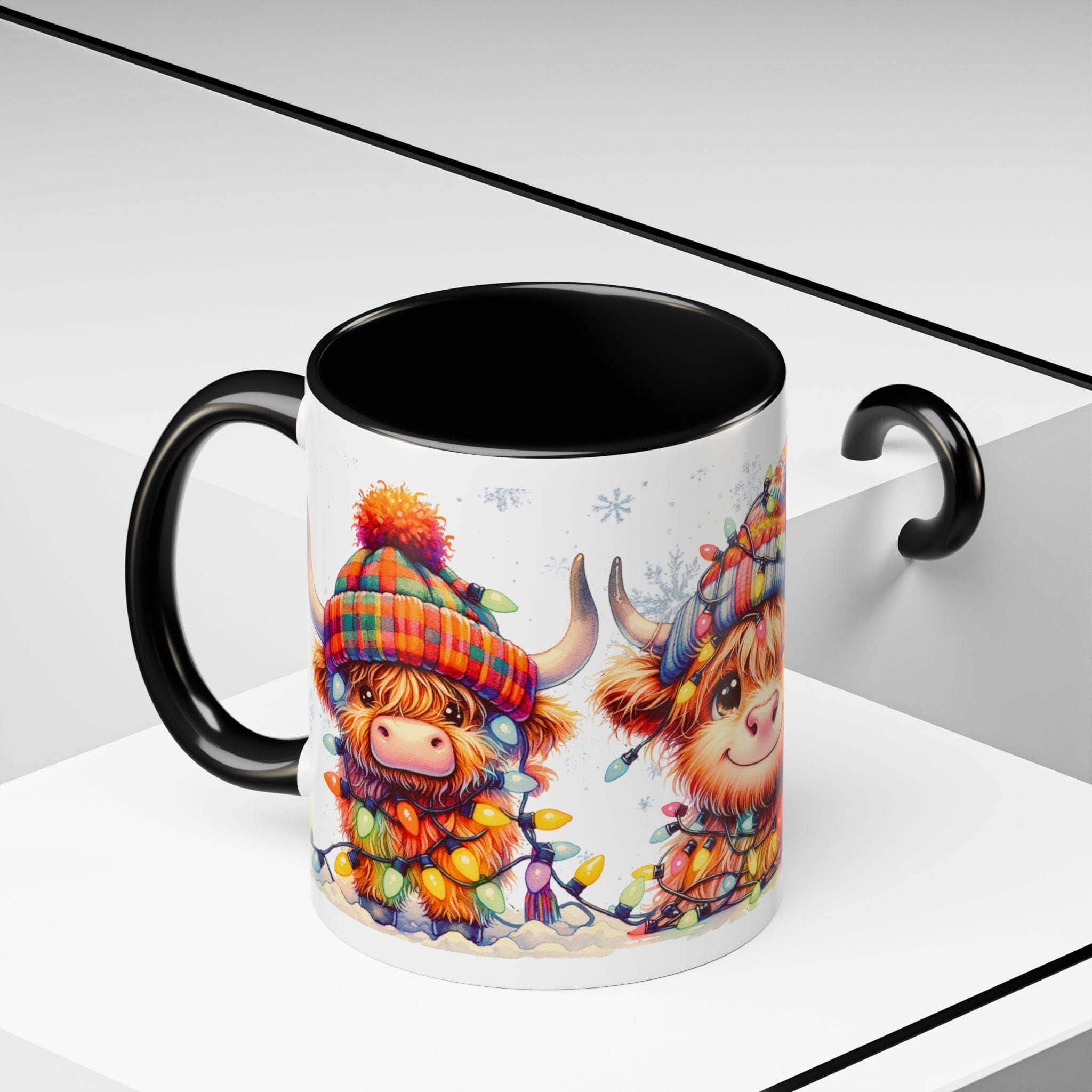 Ceramic Christmas mug with colorful Scottish Highland cow illustration and black handle and interior