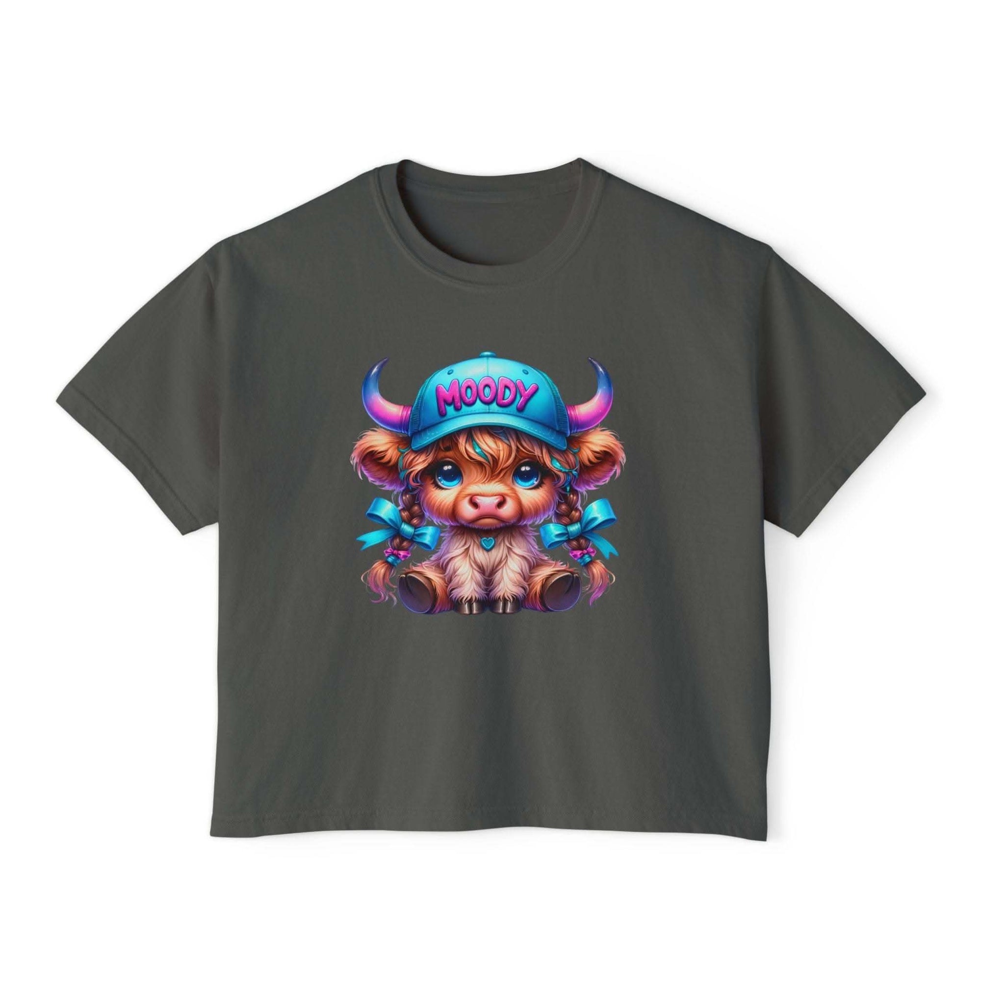 Women's boxy tee with moody girl highland cow graphic in vintage pigment dye colors