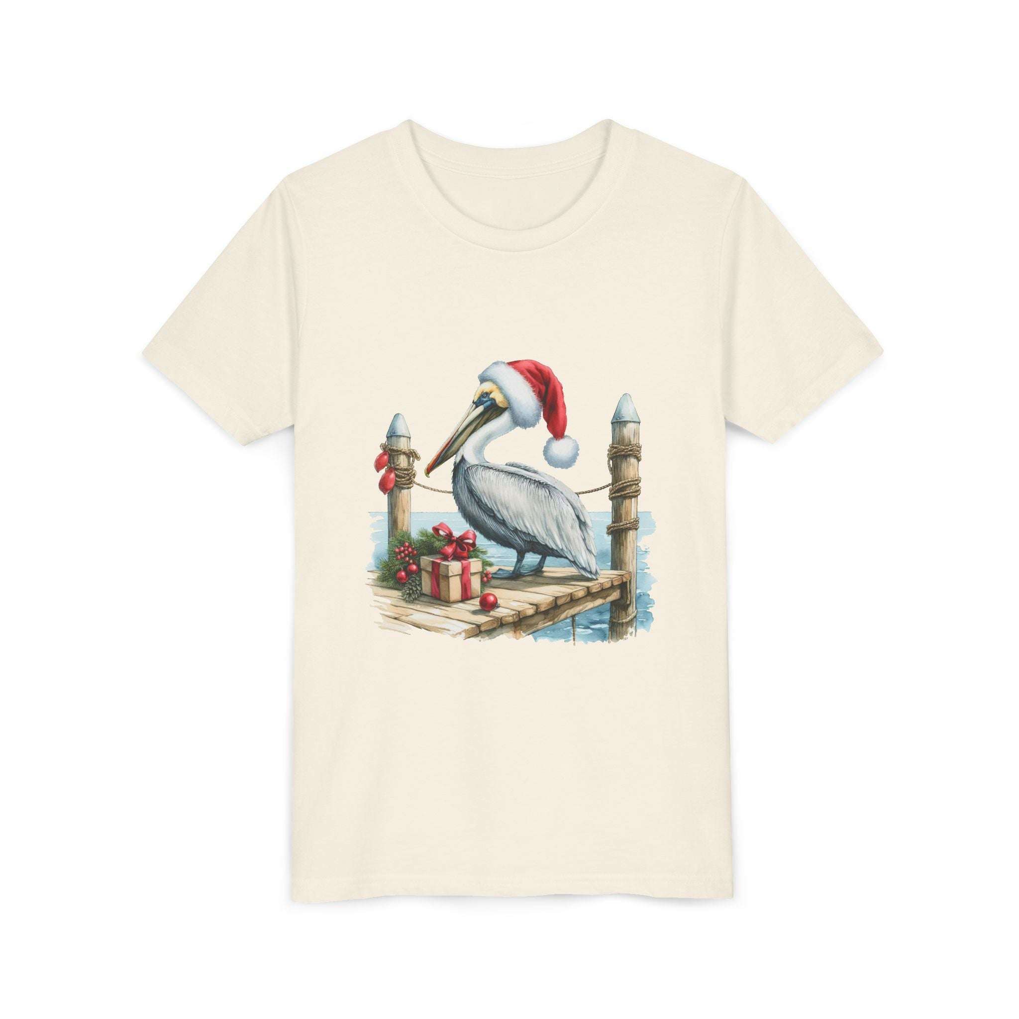 Beige t-shirt with a Christmas-themed pelican design on a white background
