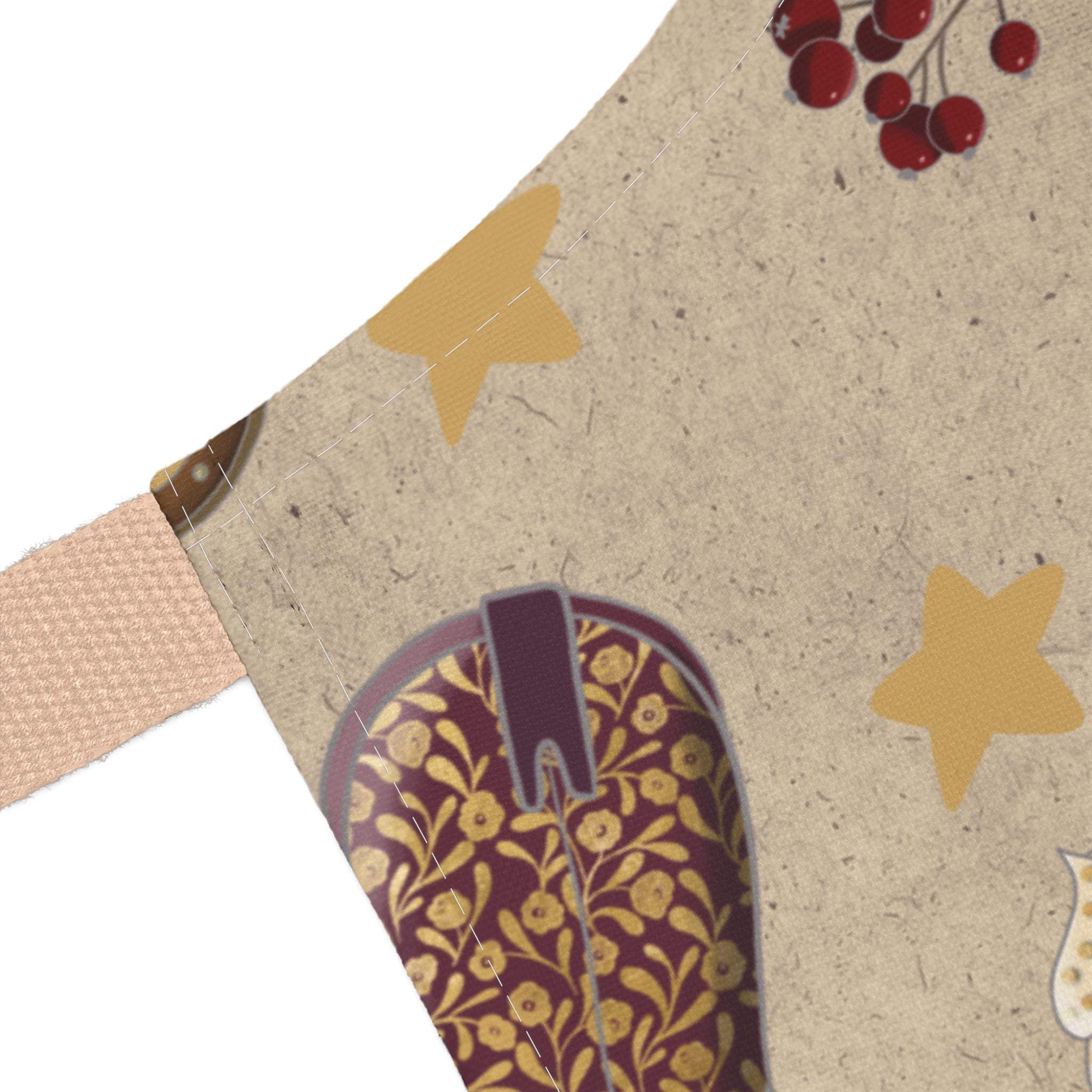Cowboy Christmas apron with festive boot and star pattern on beige fabric, tie-back closure, and soft polyester canvas material