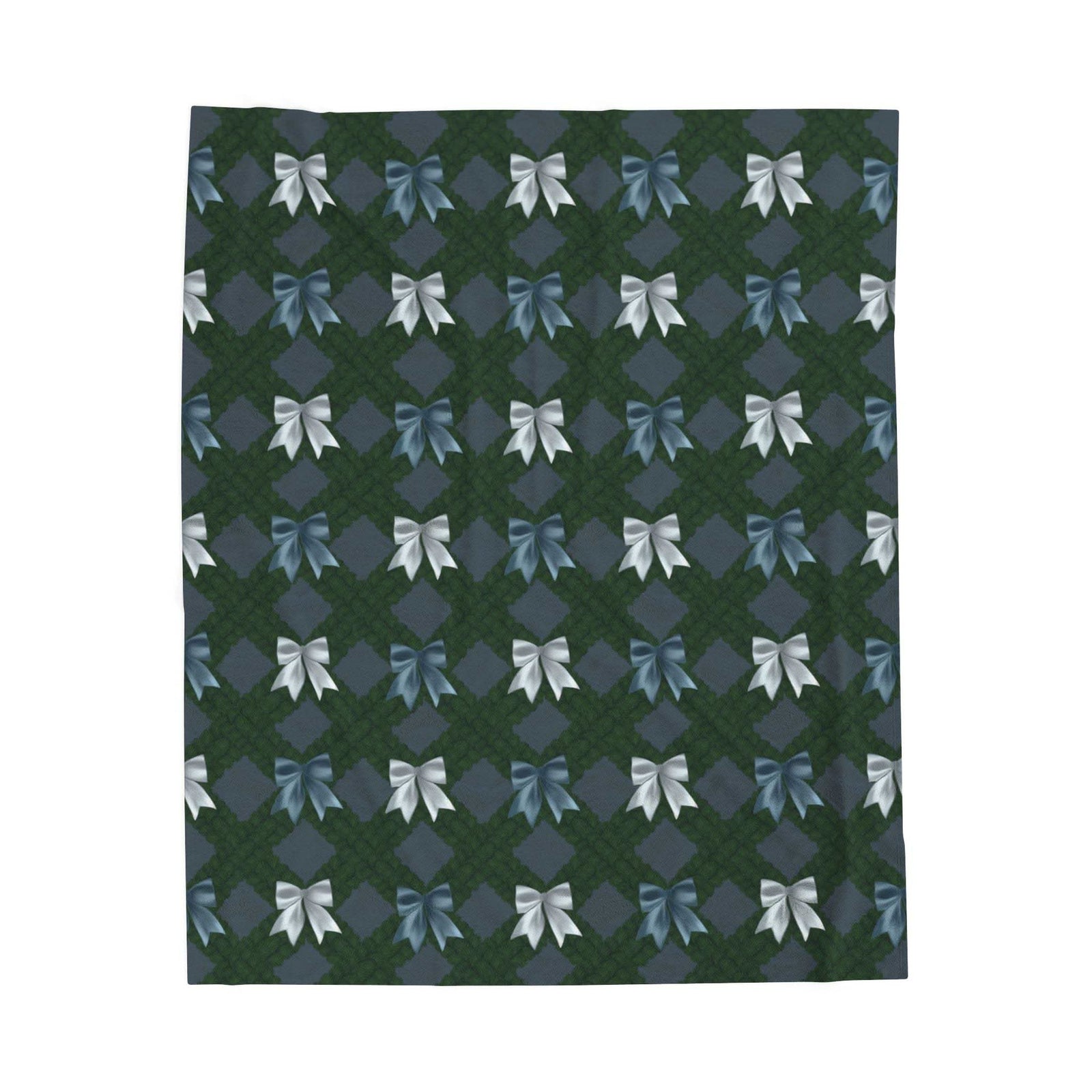Velveteen plush blanket with winter coquette bow pattern draped on sofa for cozy comfort