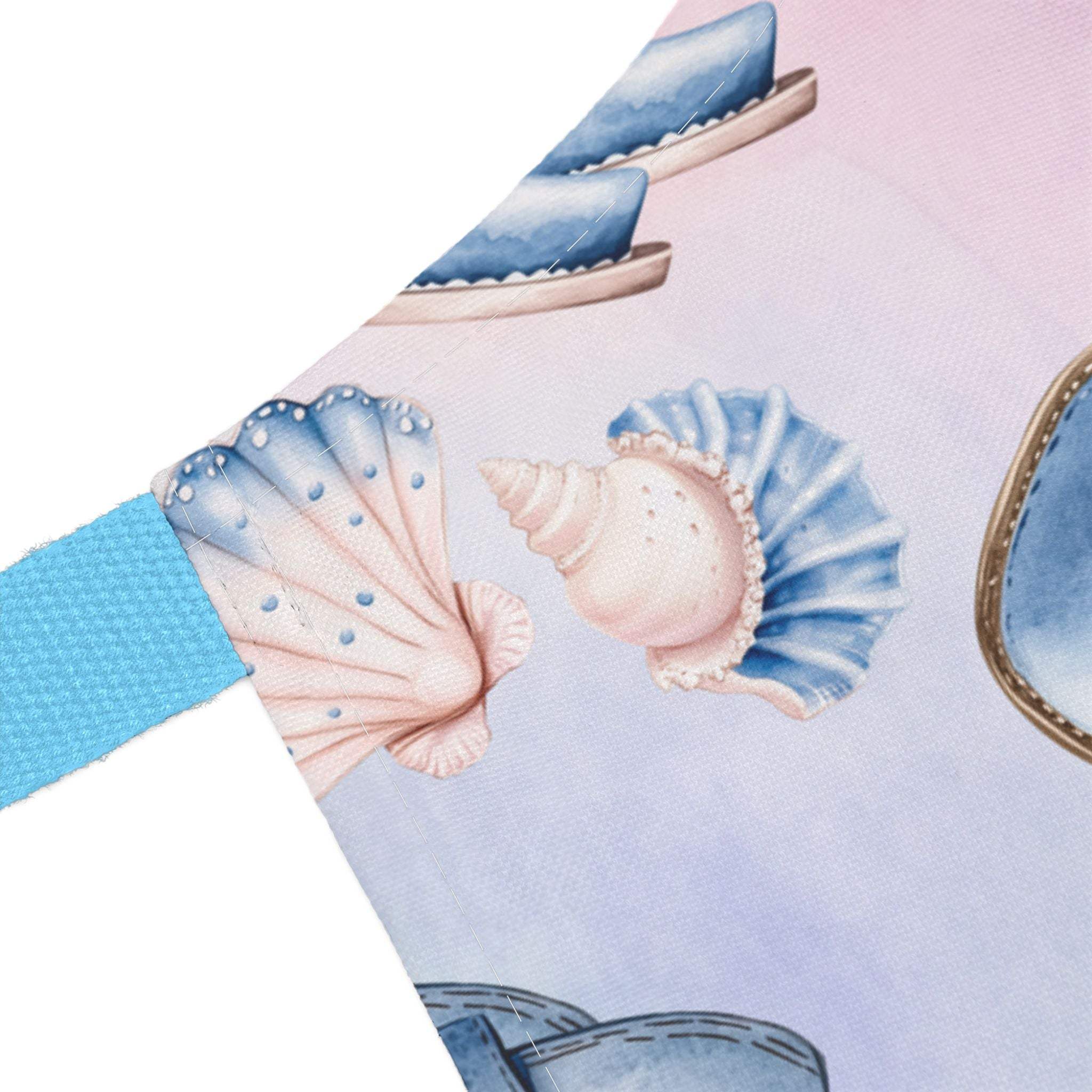 Pastel Coastal Cowgirl apron with seashell design and blue strap