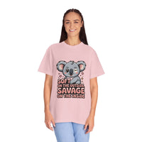 Woman wearing pink koala t-shirt with "Soft on the Outside Savage on the Inside" graphic