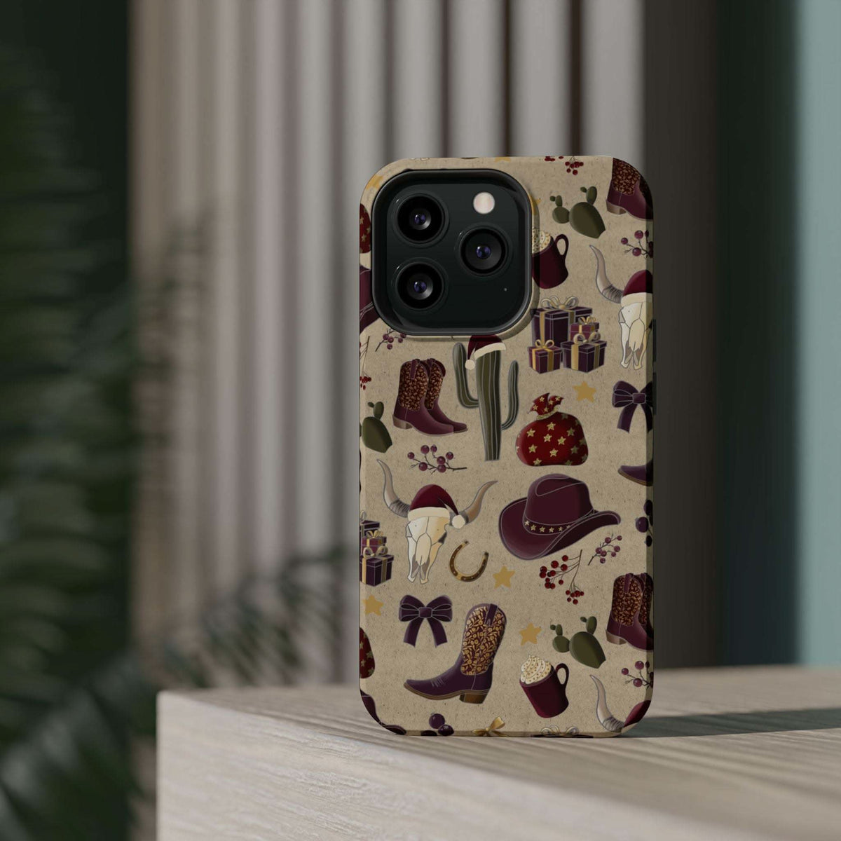 Cowboy Christmas design phone case for iPhone 17 in glossy finish by Printify, featuring festive colors and patterns.