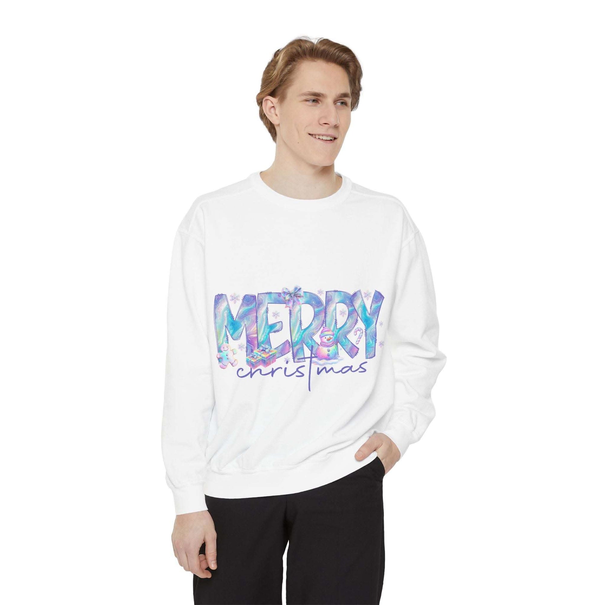 Young man wearing a white sweatshirt with iridescent Merry Christmas design and relaxed fit