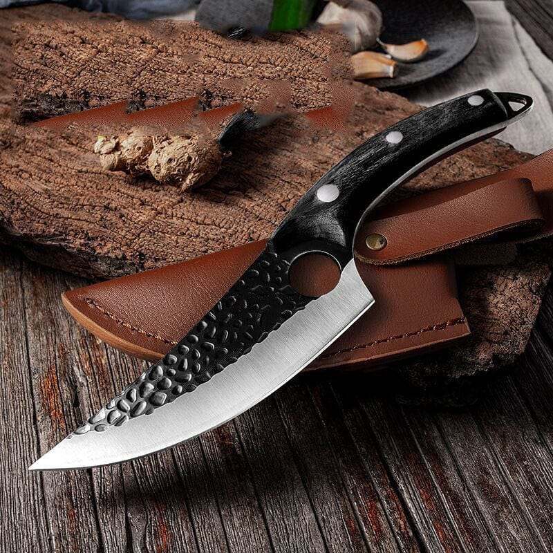 Small curved slaughter cutting meat knife with hammered high carbon steel blade and black handle with leather sheath