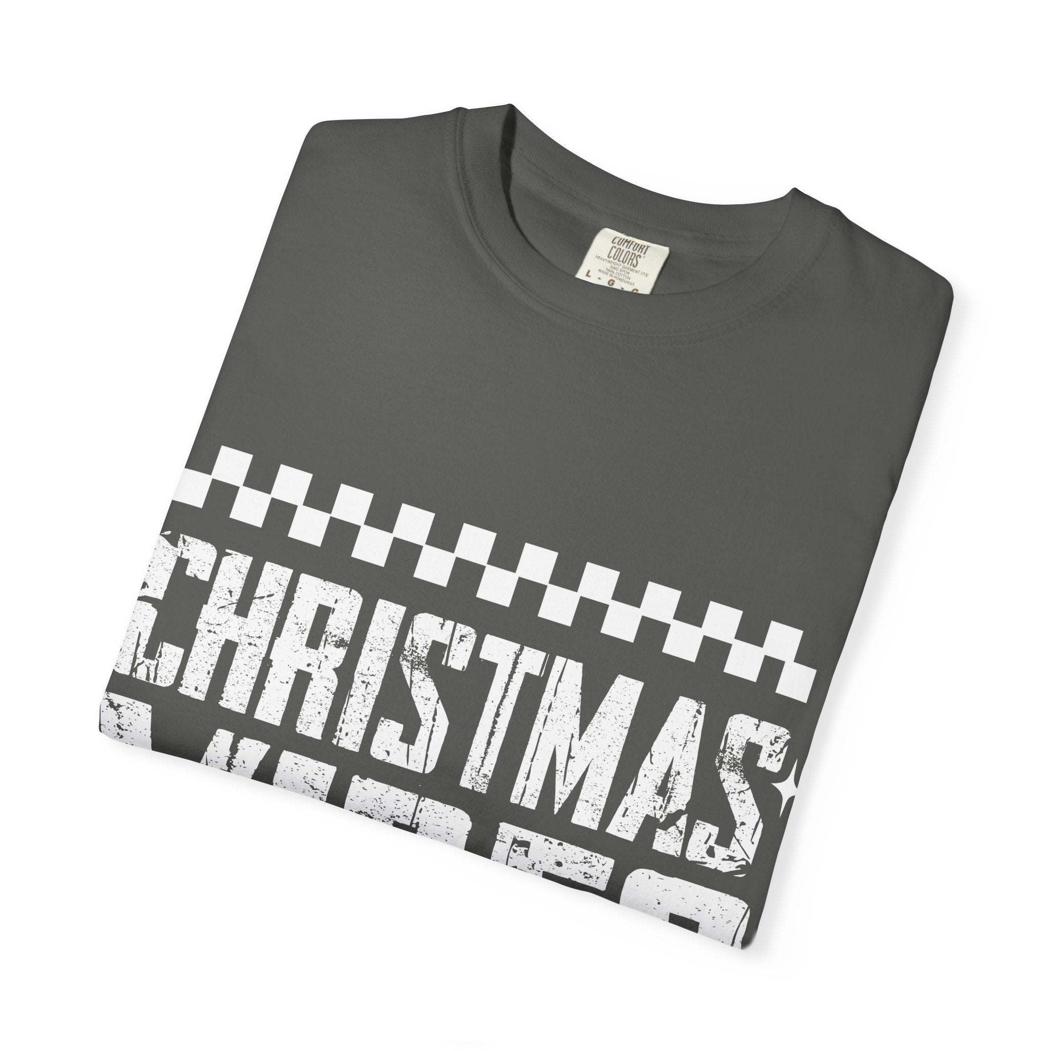 Soft distressed Christmas Vibes T-shirt with faded holiday graphics and garment-dyed tones
