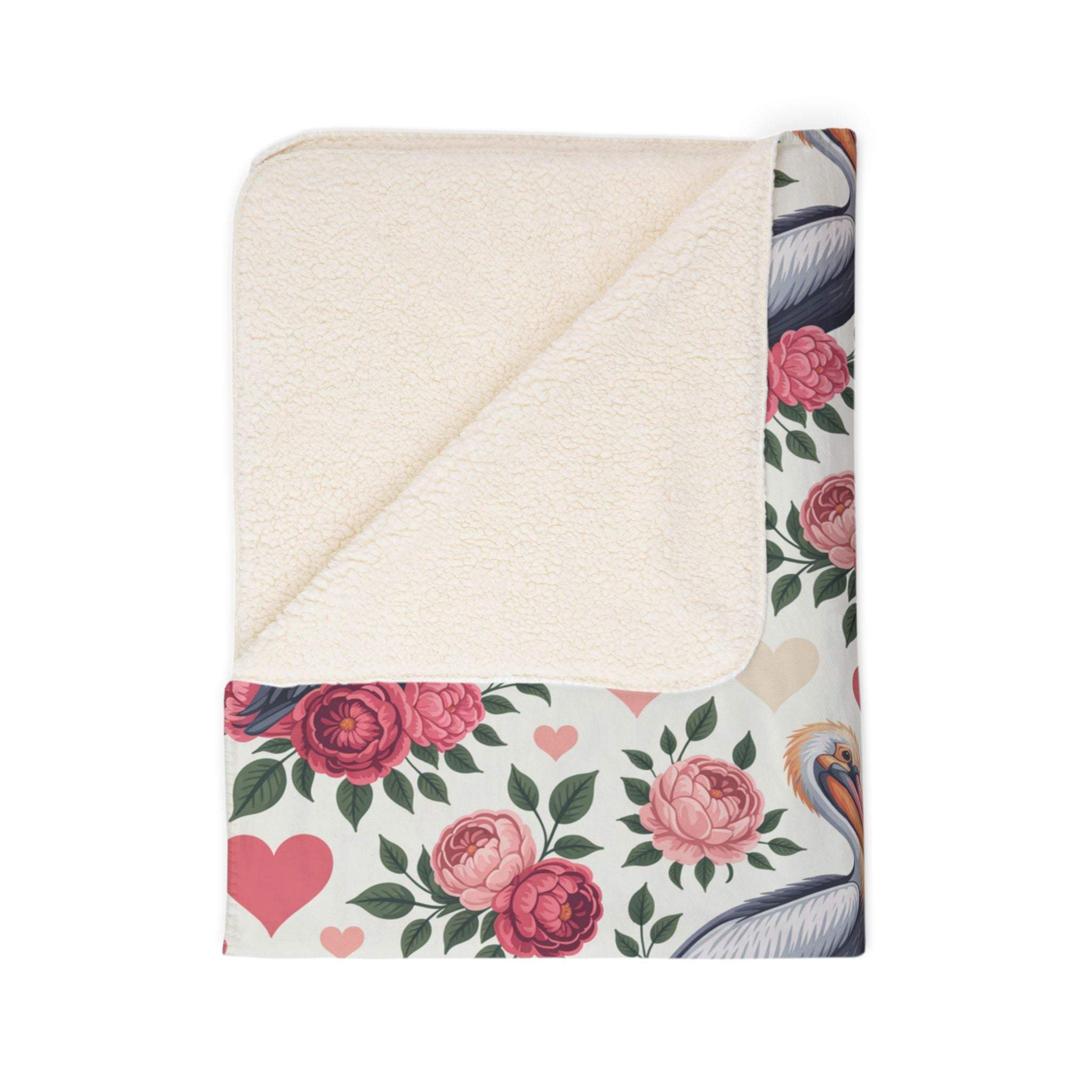Soft fleece Sherpa blanket with floral pelican print for cozy, romantic beach vibes