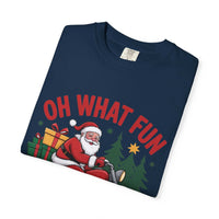 Santa on a Motorcycle Christmas t-shirt with festive design and gifts on navy blue fabric