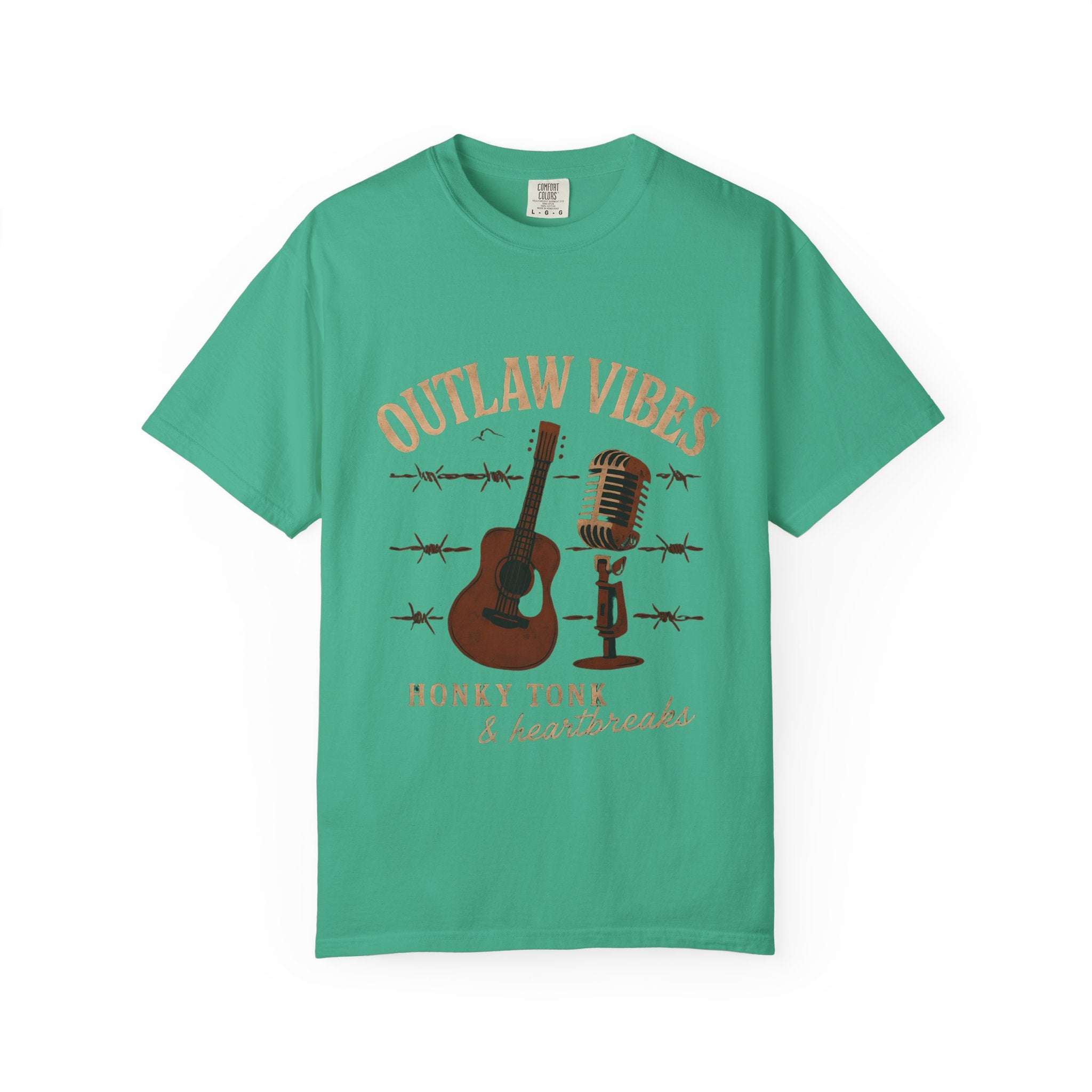Green t-shirt with 'Outlaw Vibes' graphic design featuring a guitar, microphone, and barbed wire on a white background.