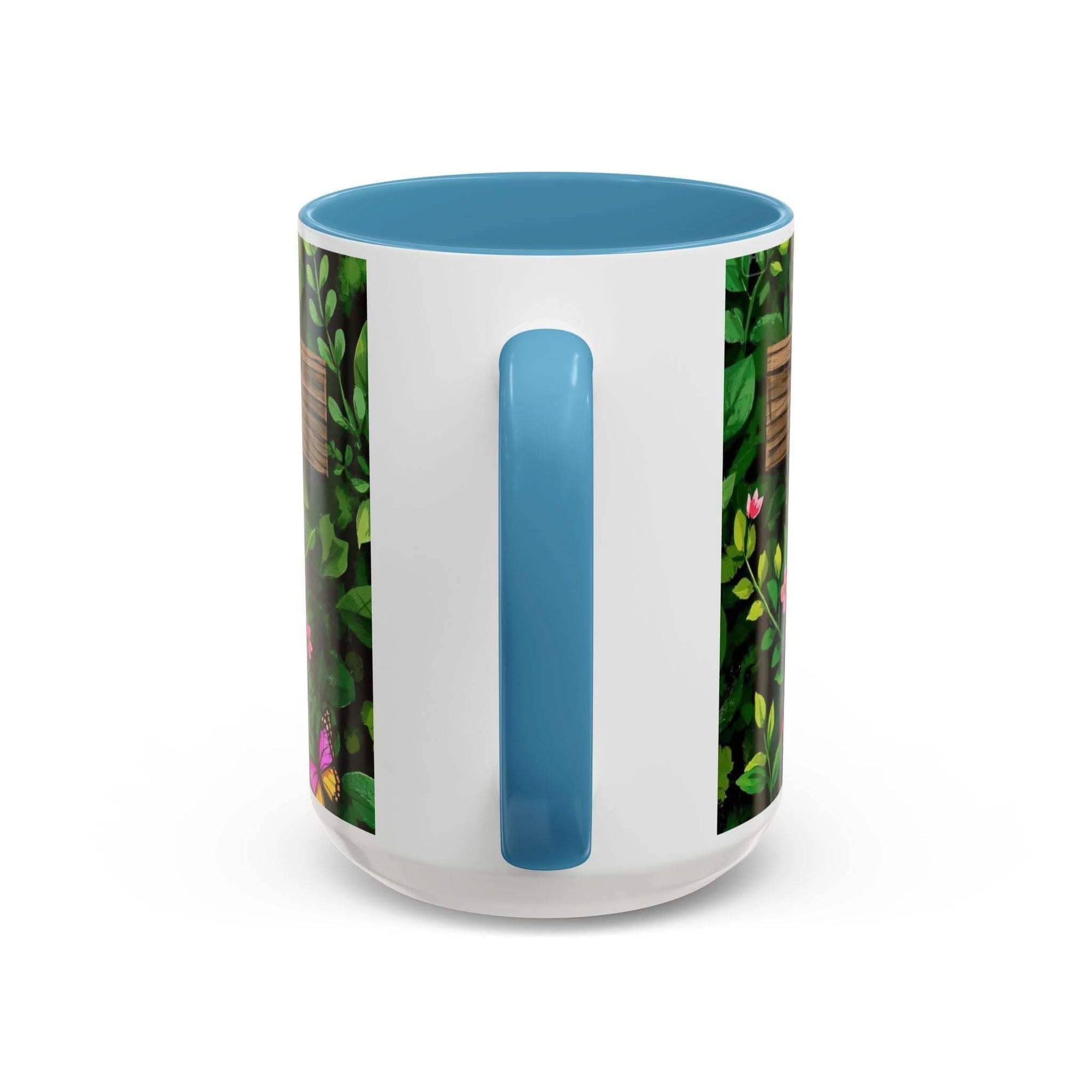 Mug with blue interior and handle, floral pattern on sides, on a white background
