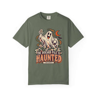 Moss green Comfort Colors 1717 Halloween mahjong T-shirt with a ghost holding a tile and “The Discard Pile Is Haunted (Obviously)” lettering.