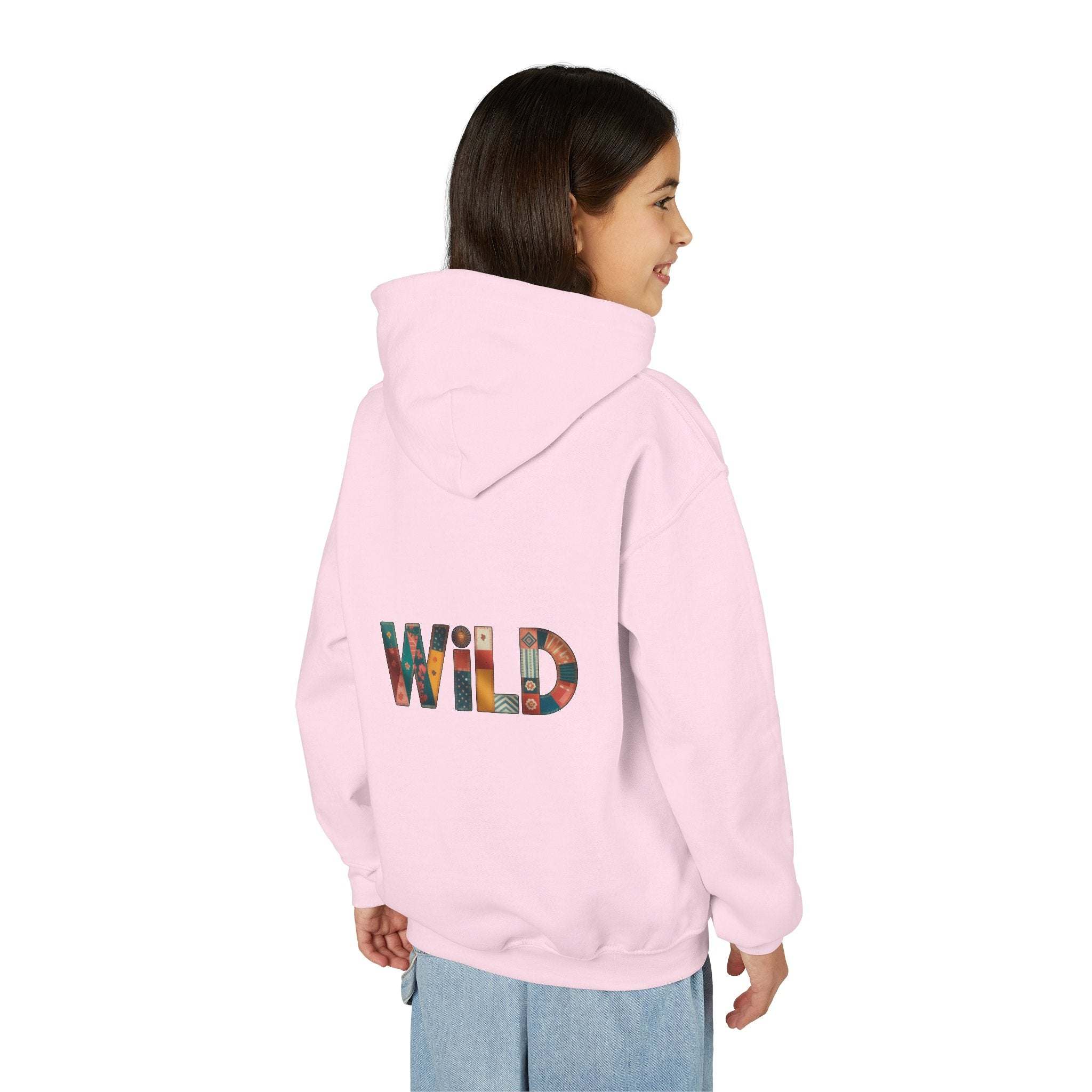 Child wearing pink Patchwork Wild Word Hoodie with colorful "WILD" text on back and kangaroo pocket