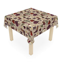 Cowboy Christmas tablecloth with western-themed holiday design on square table