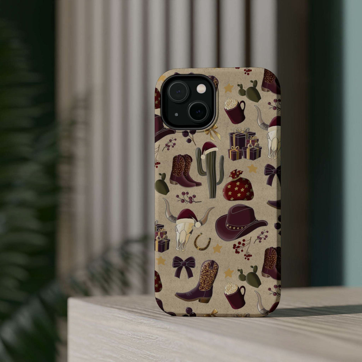 Cowboy Christmas design phone case for iPhone 17 in glossy finish by Printify, featuring festive colors and patterns.