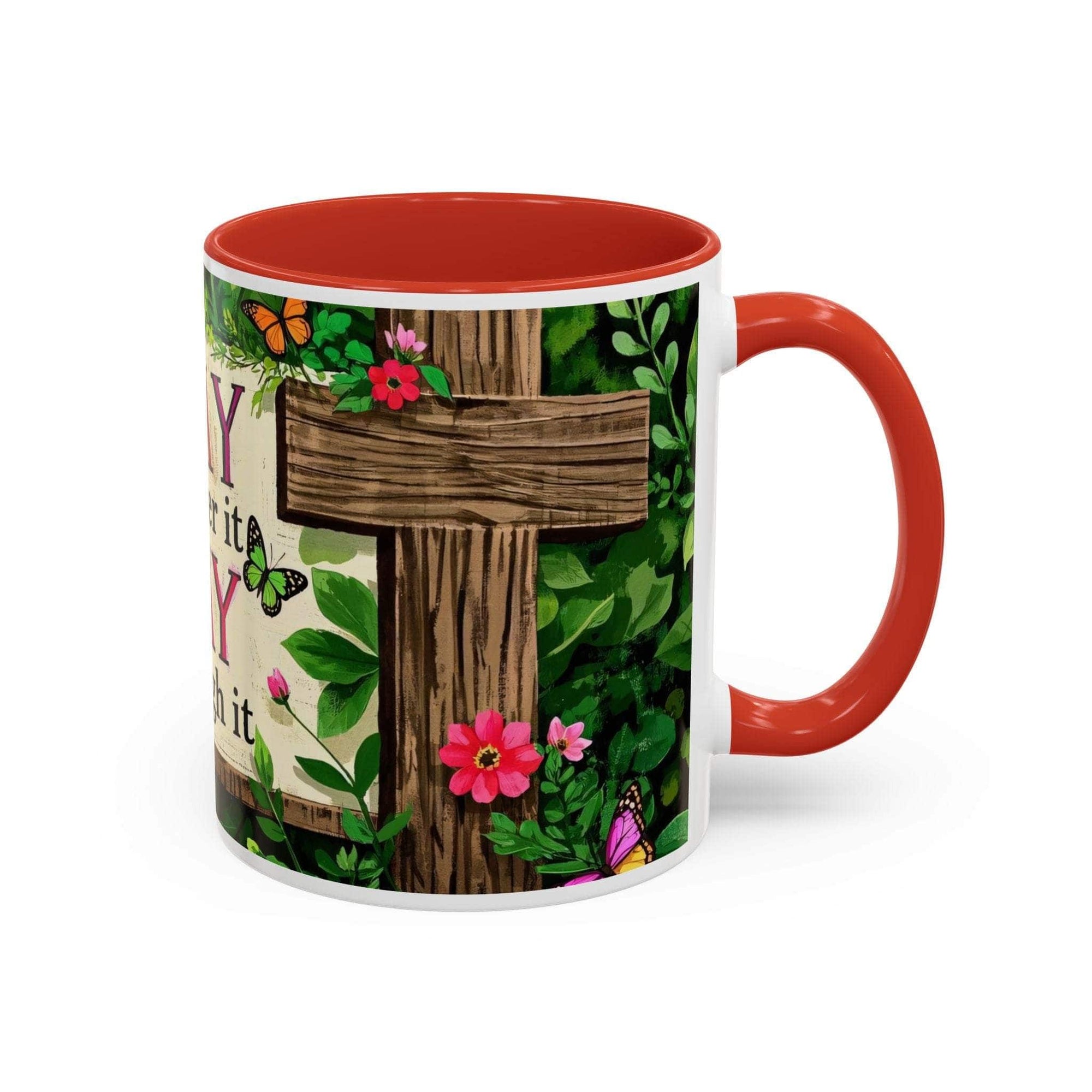 Mug with a cross design, flowers, and text on a white background