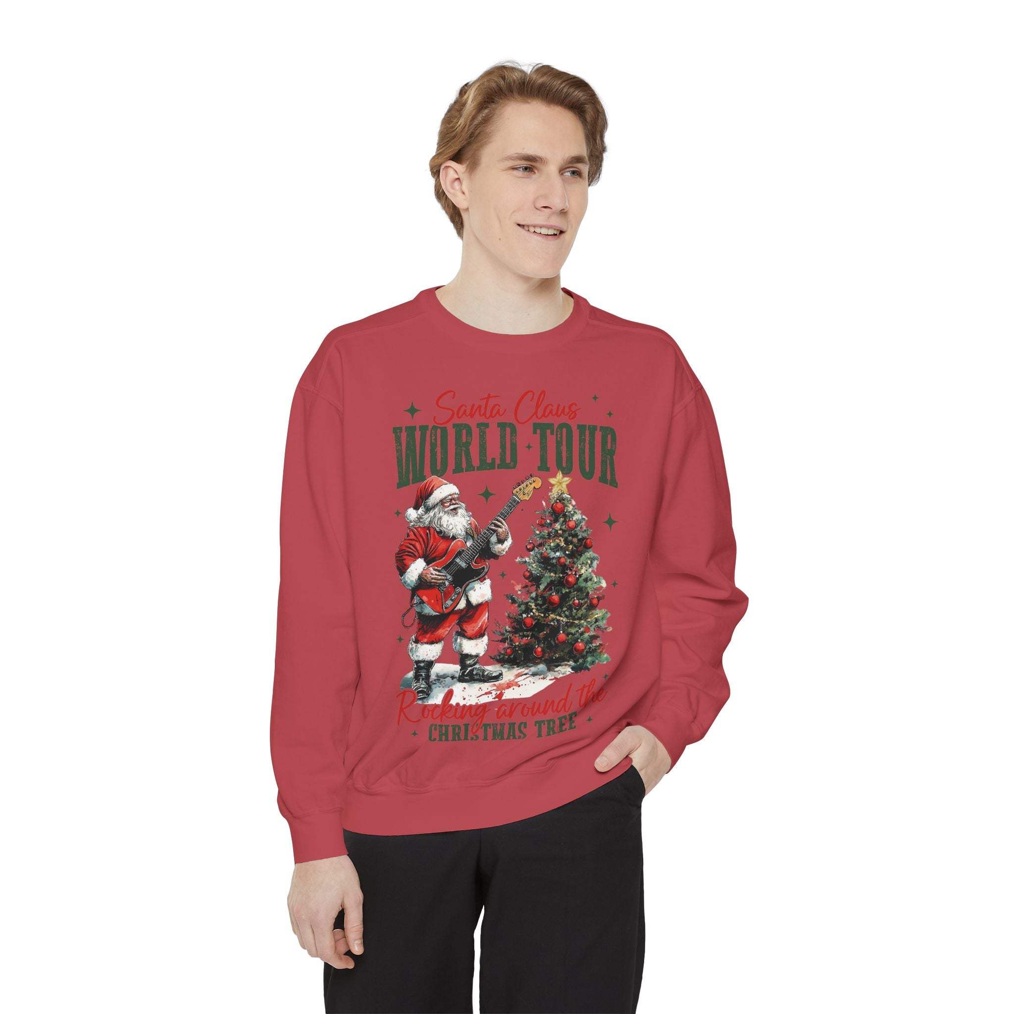 Red Sweatshirt Rocking Santa World Tour with festive guitar-playing Santa and Christmas tree design