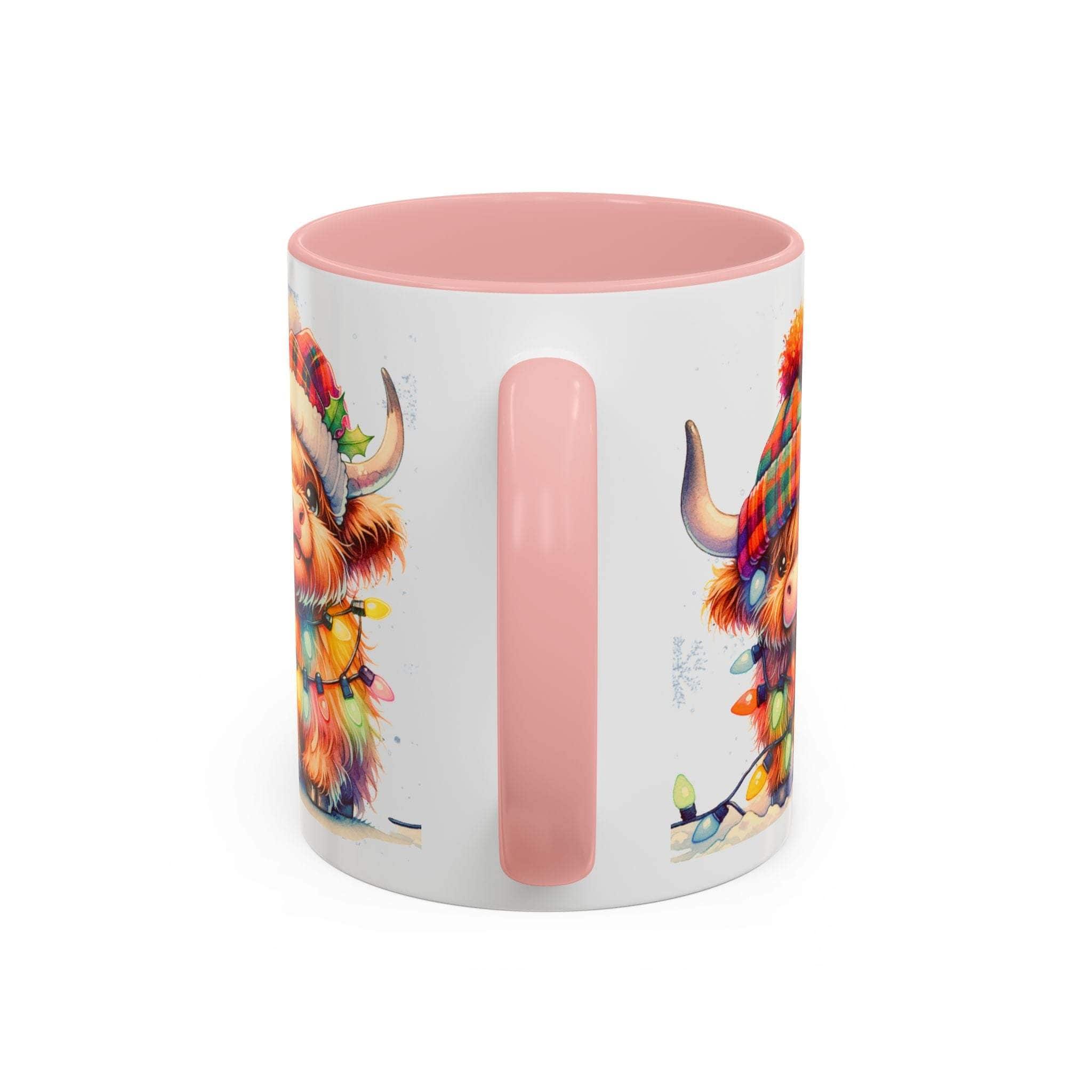 Mug with colorful animal design and pink handle on a white background
