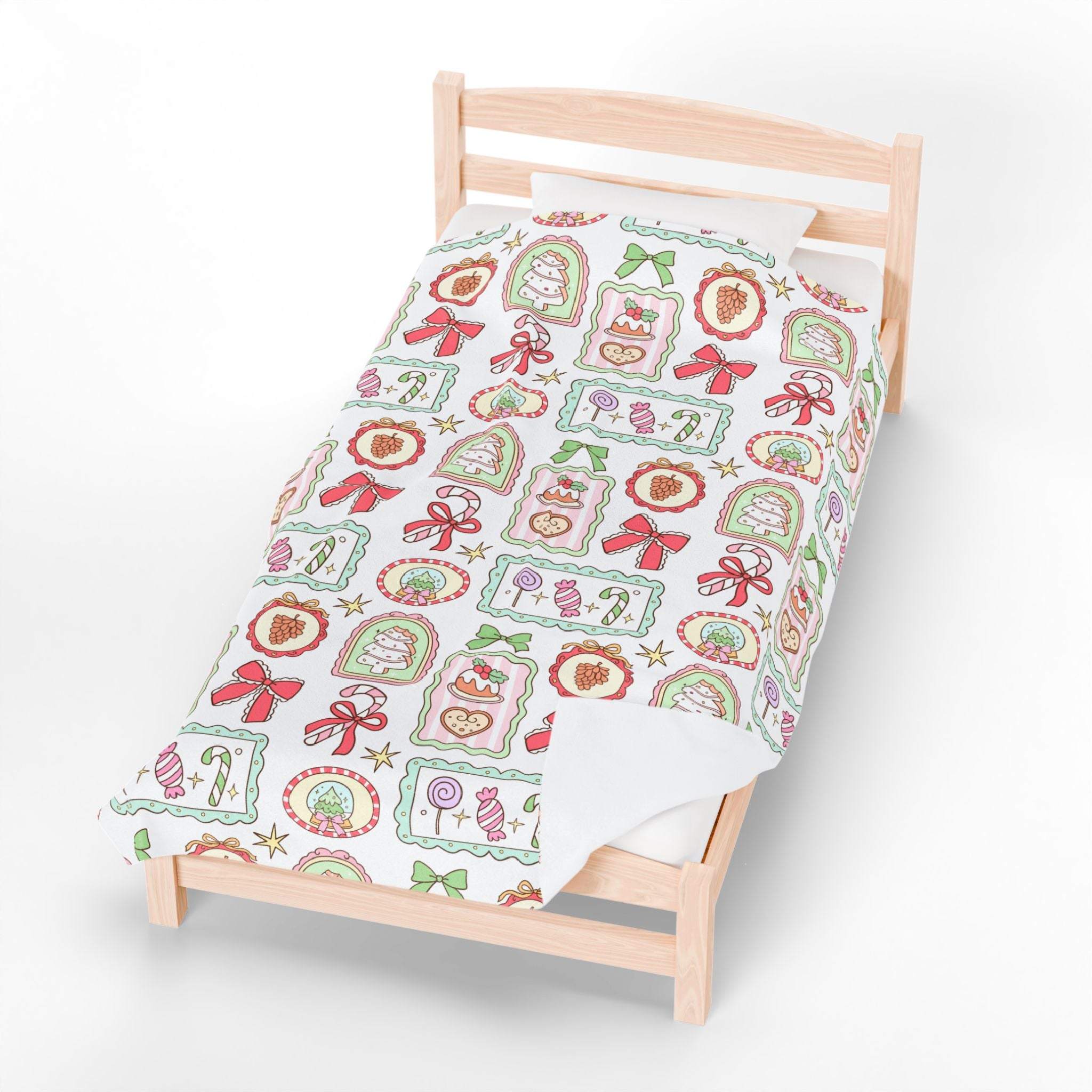 Velveteen plush blanket with retro Christmas frames on wooden bed