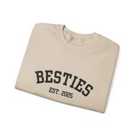 Beige sweatshirt with 'BESTIES EST. 2025' text on a white background