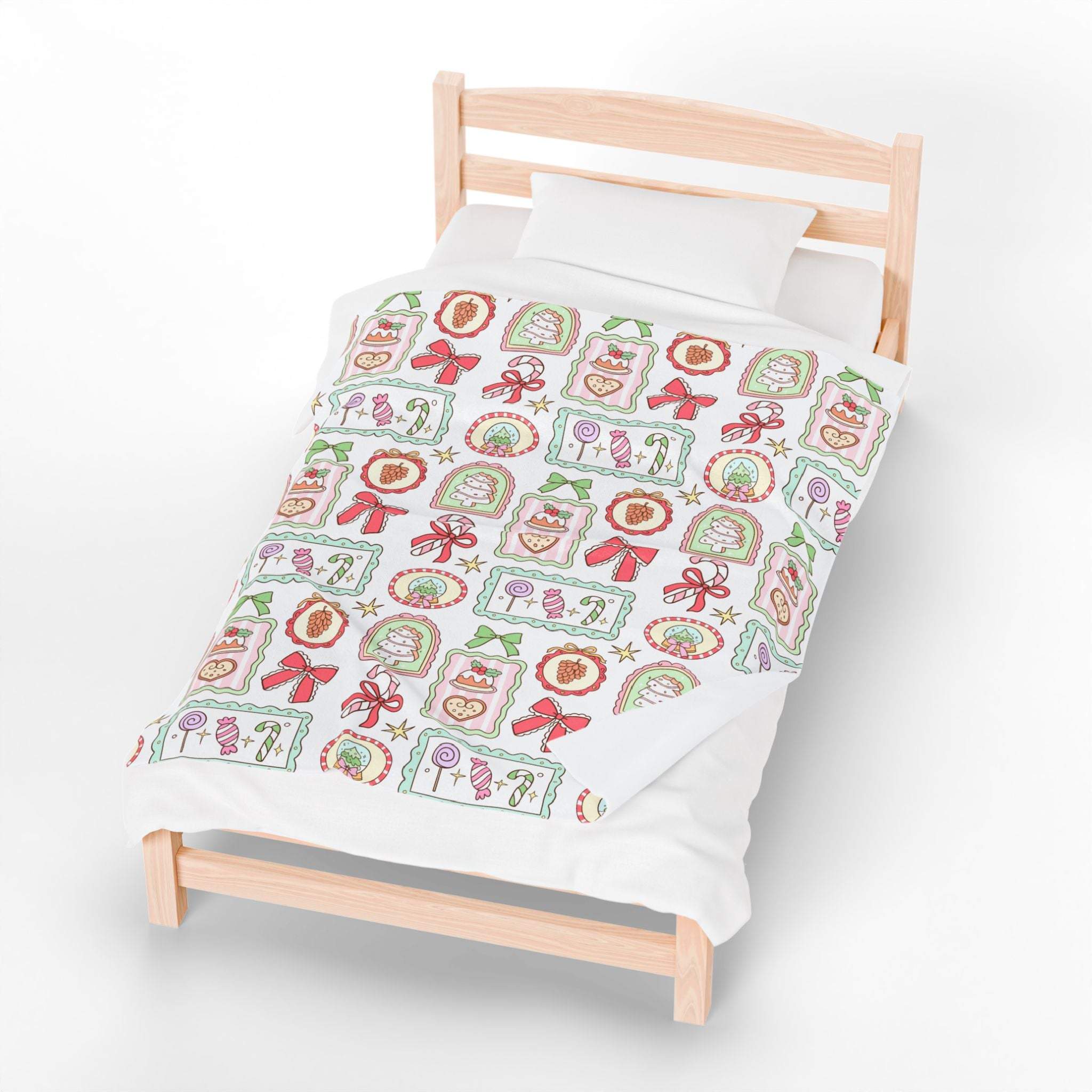 Velveteen plush blanket with retro Christmas frames design on bed