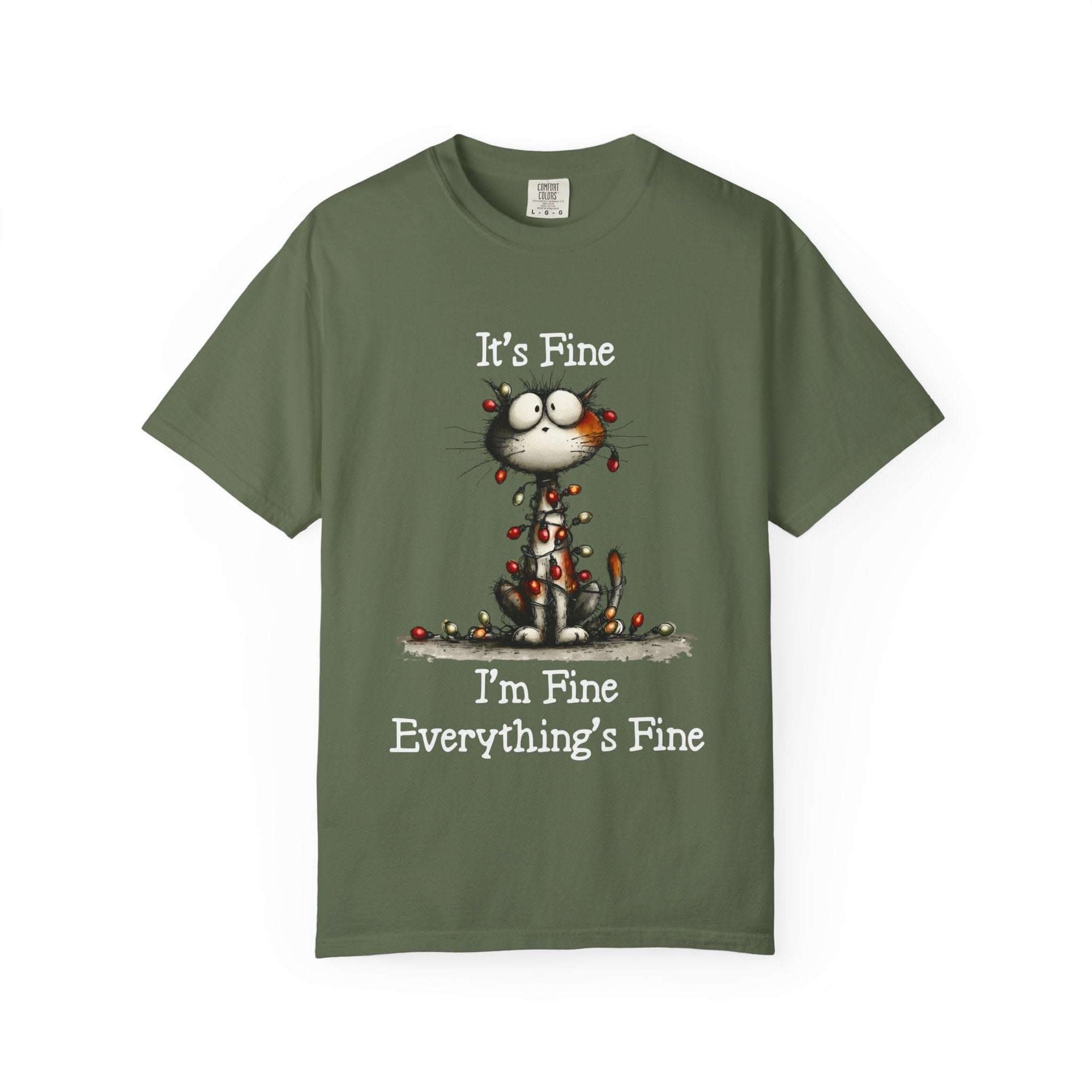 Garment-dyed cotton cat t-shirt with humorous "It's Fine, I'm Fine, Everything's Fine" text and small cat illustration.