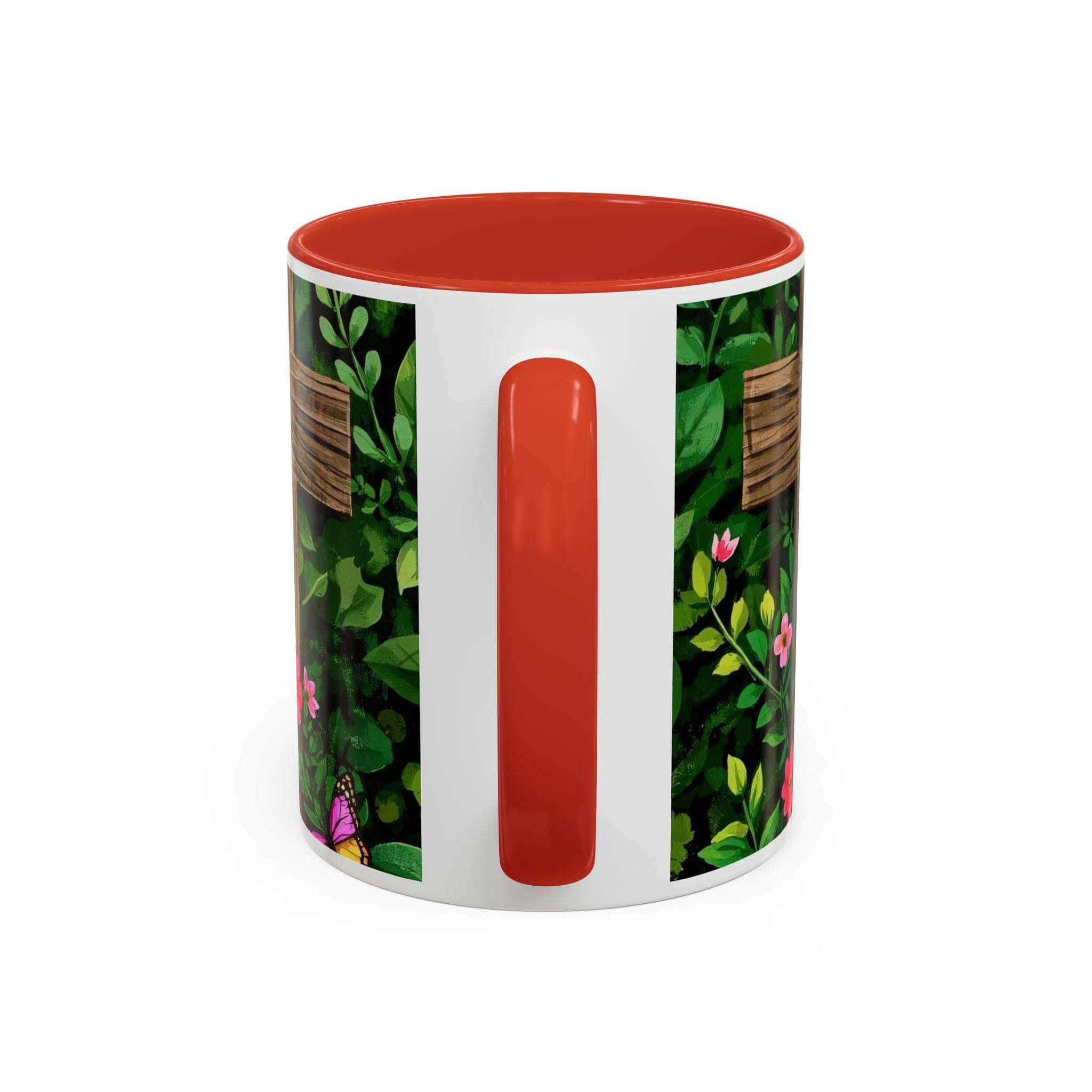 Mug with floral design and red interior on a white background